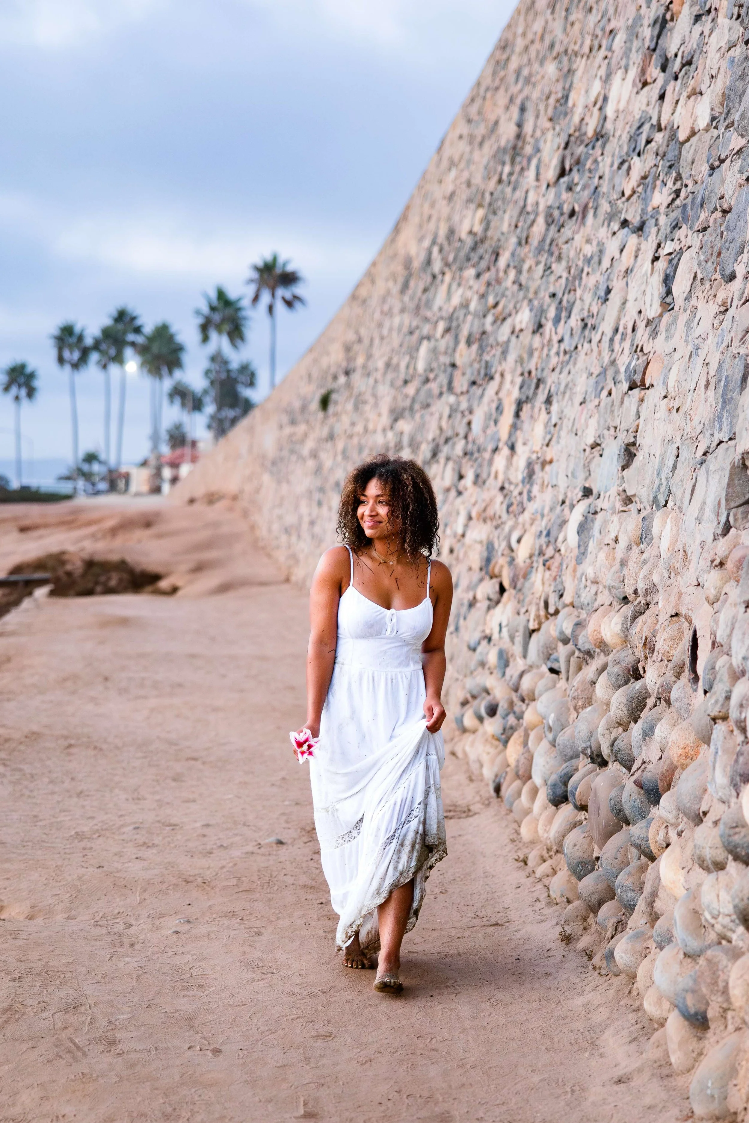 woman-white-dress-wall-walking.jpeg