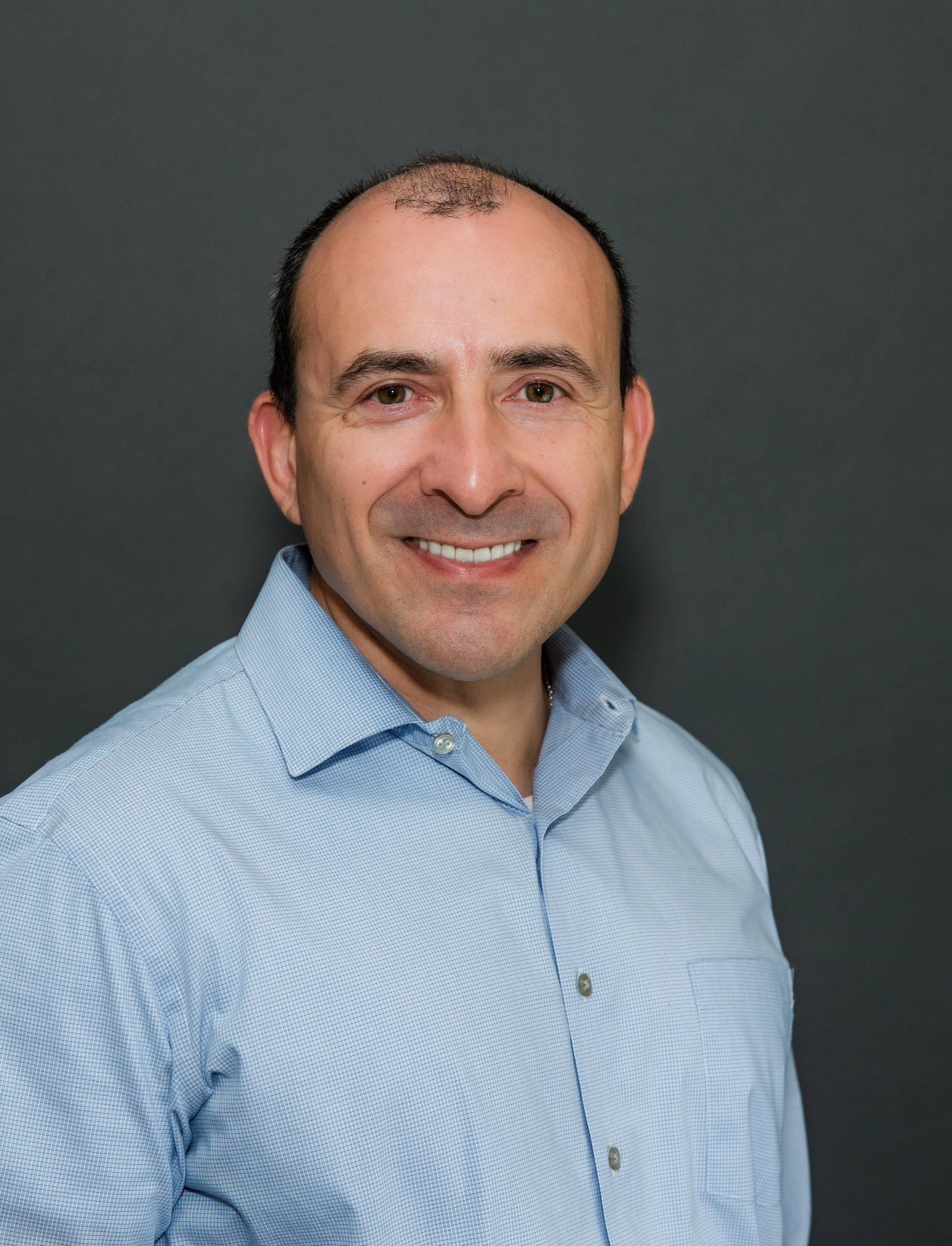 man in blue business shirt.jpg