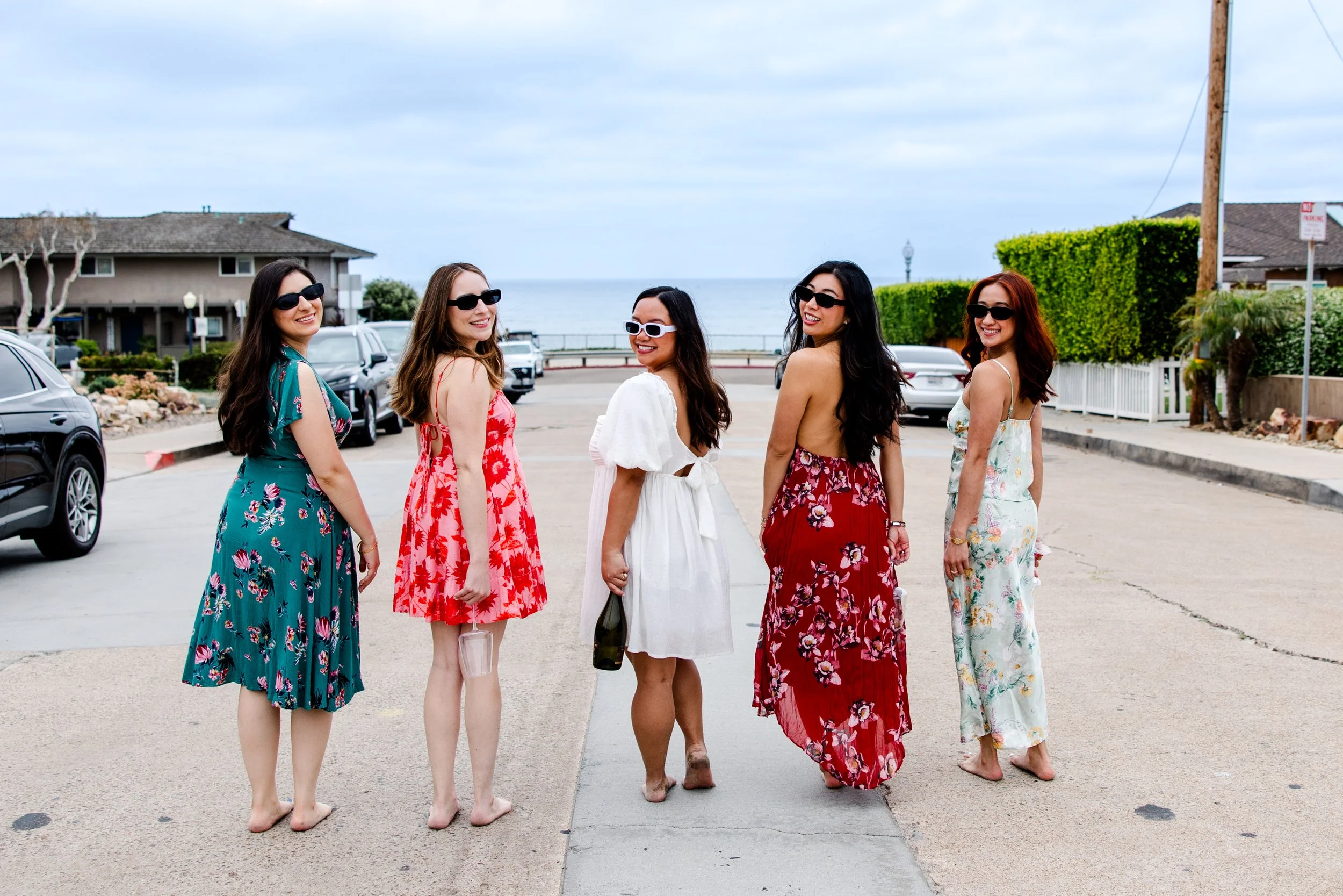 women walking away beach photography