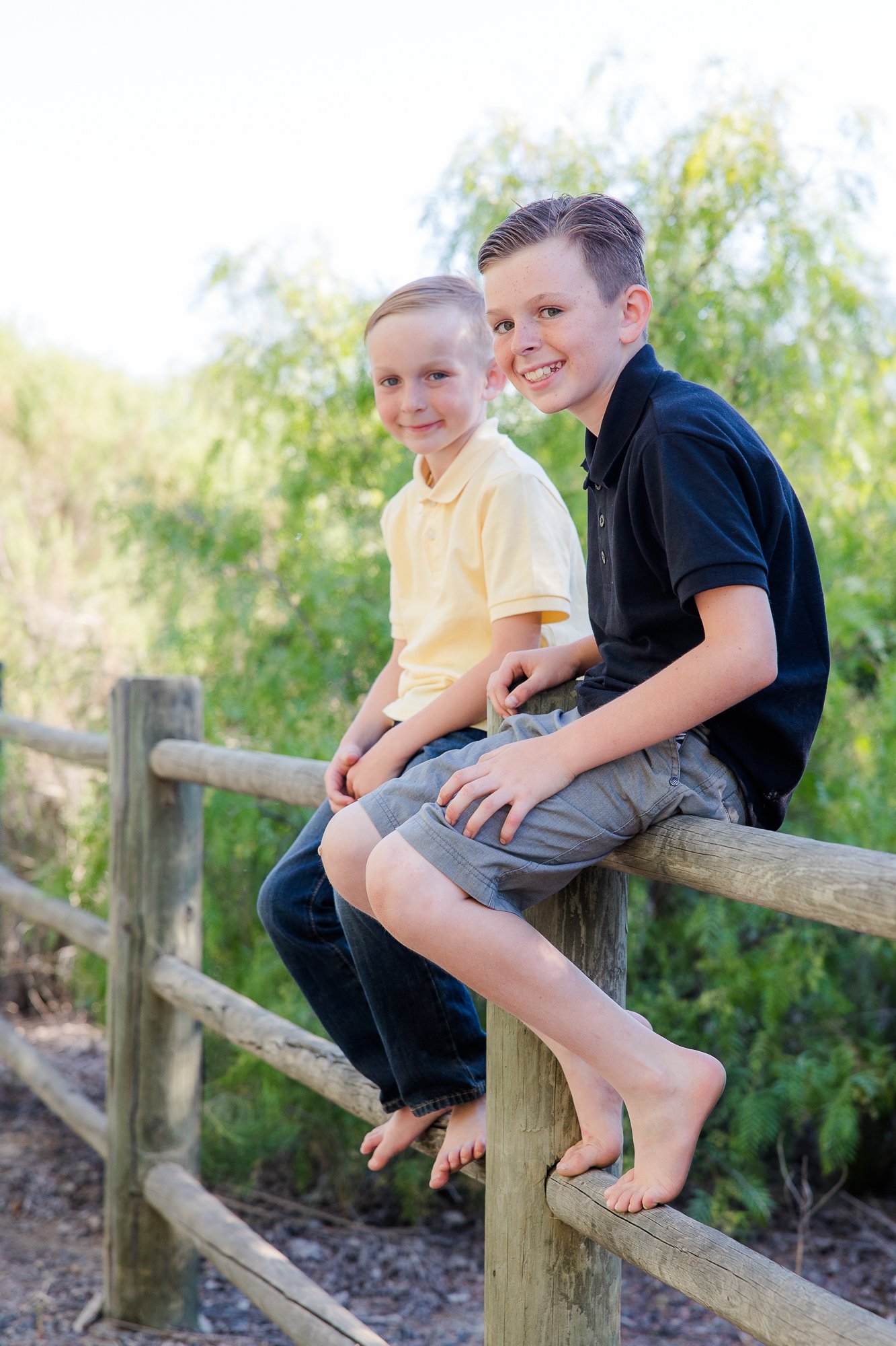 boys-sitting-fence-poses.jpg