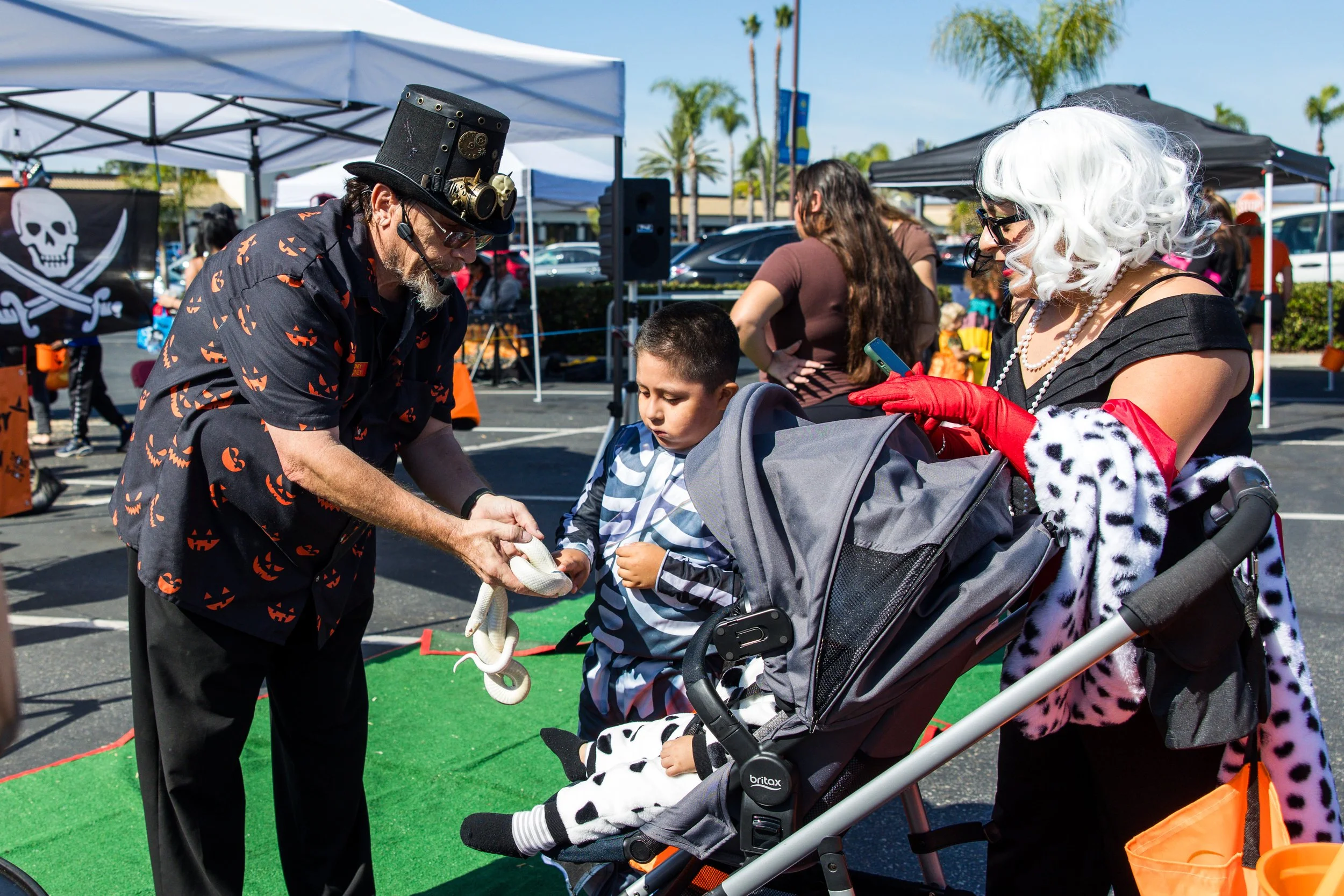 family petting snake magician