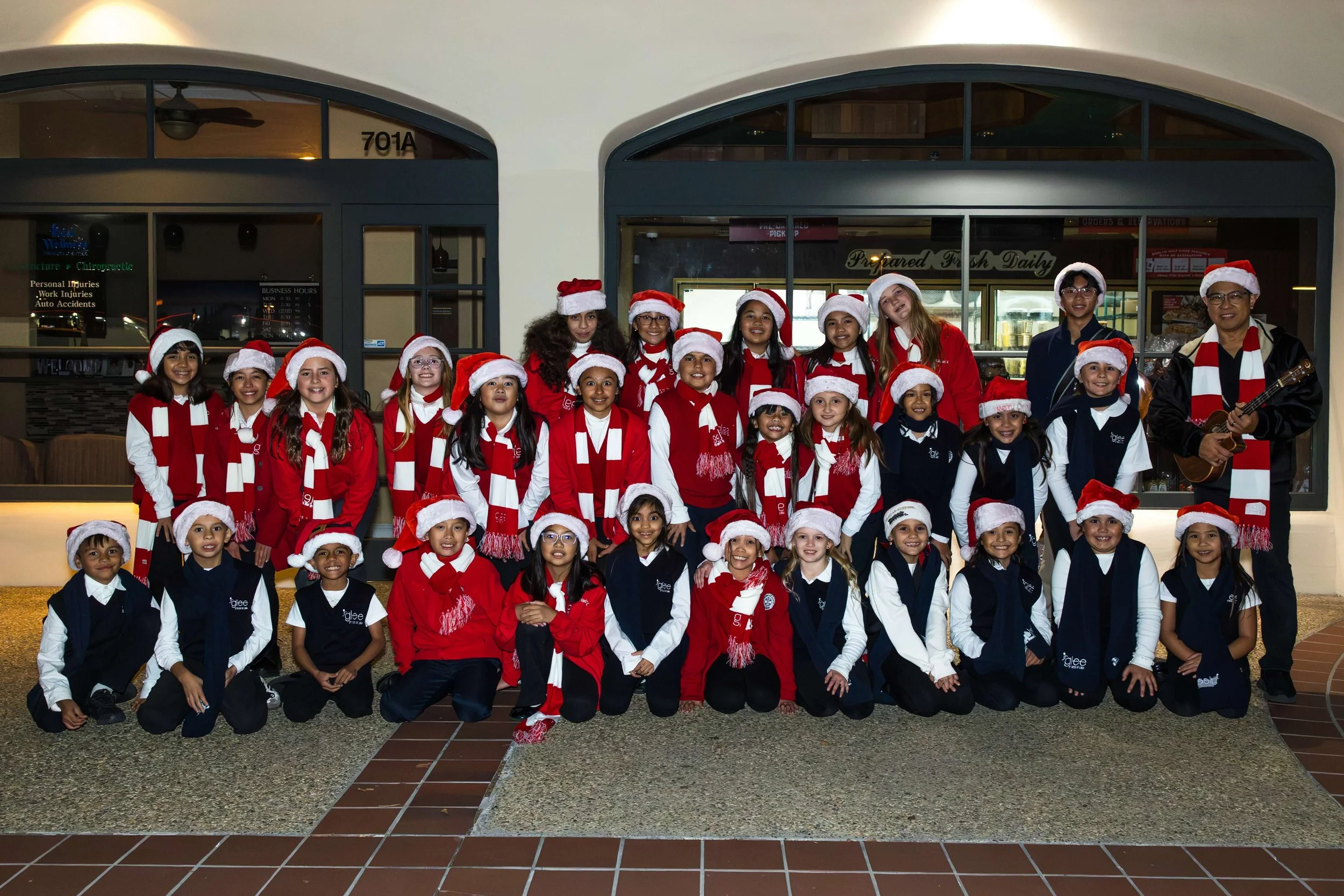 caroling-group-terra-nova-plaza.jpeg