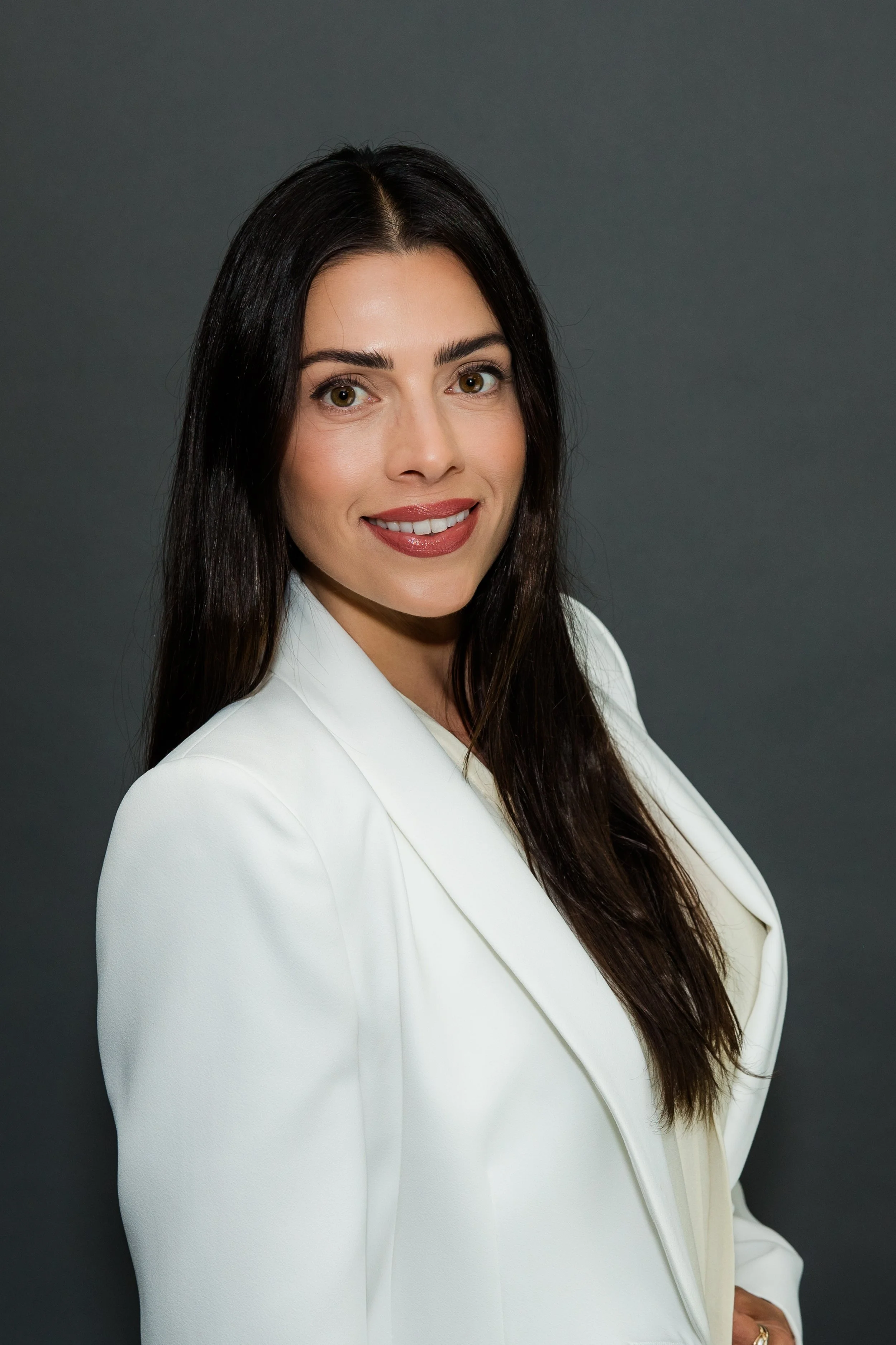 woman in white blazer.jpg