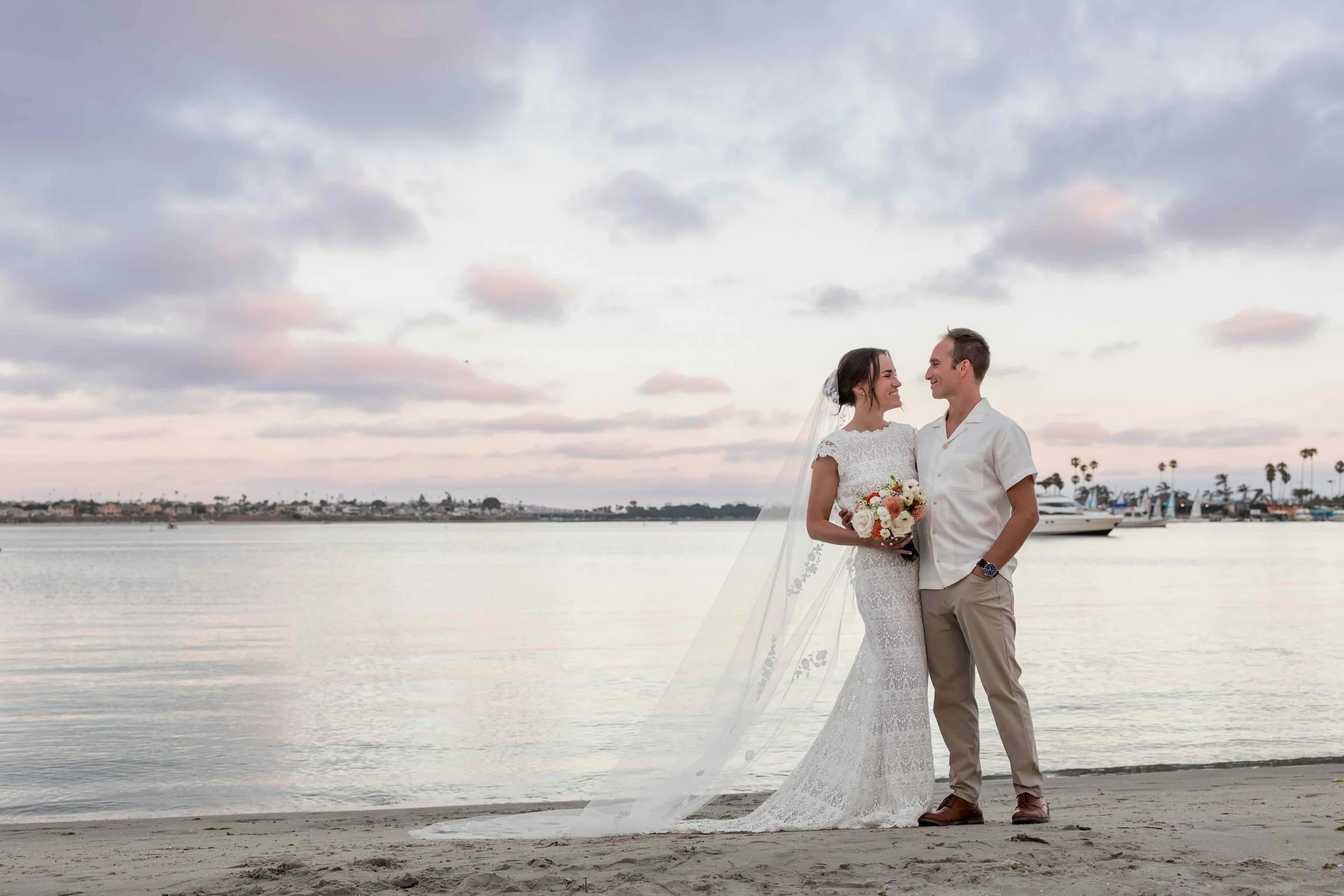 Wedding couple standing mission bay San Diego