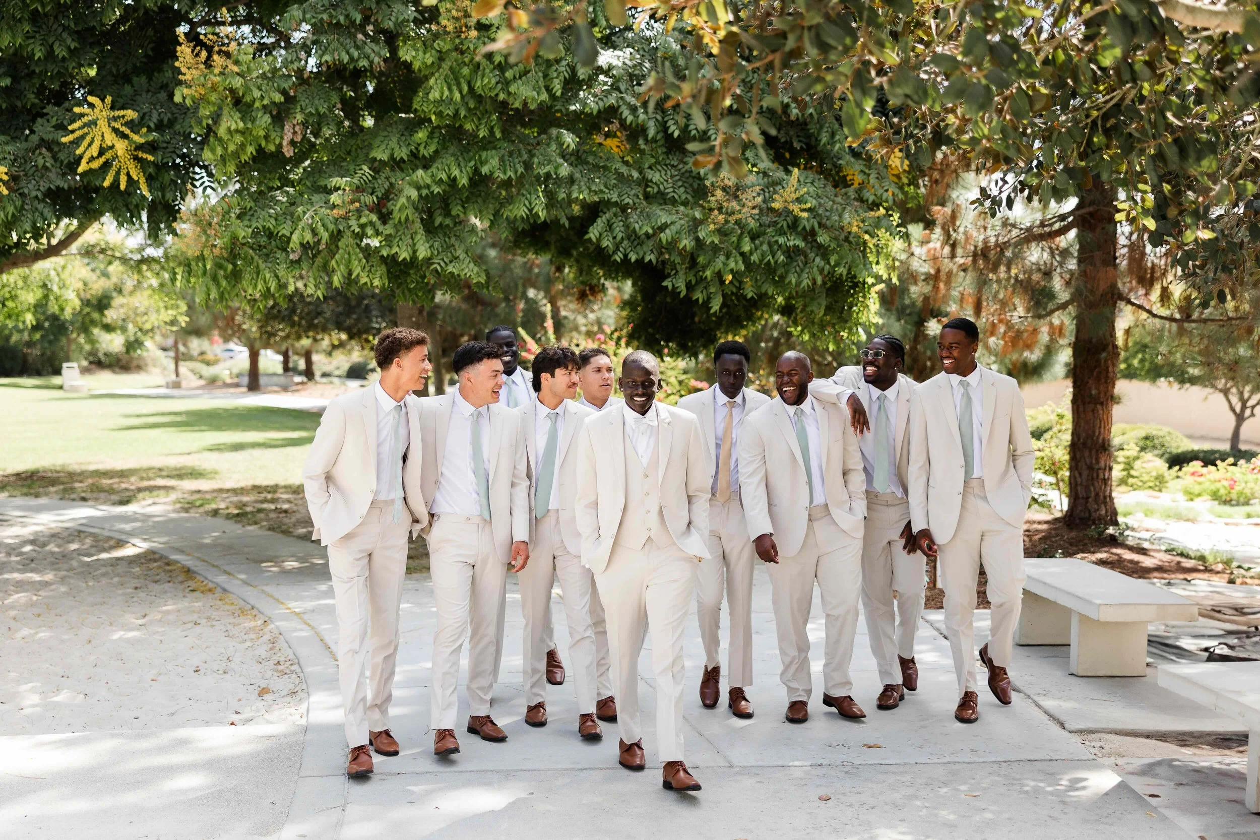 groom-groomsmen-walking.jpeg