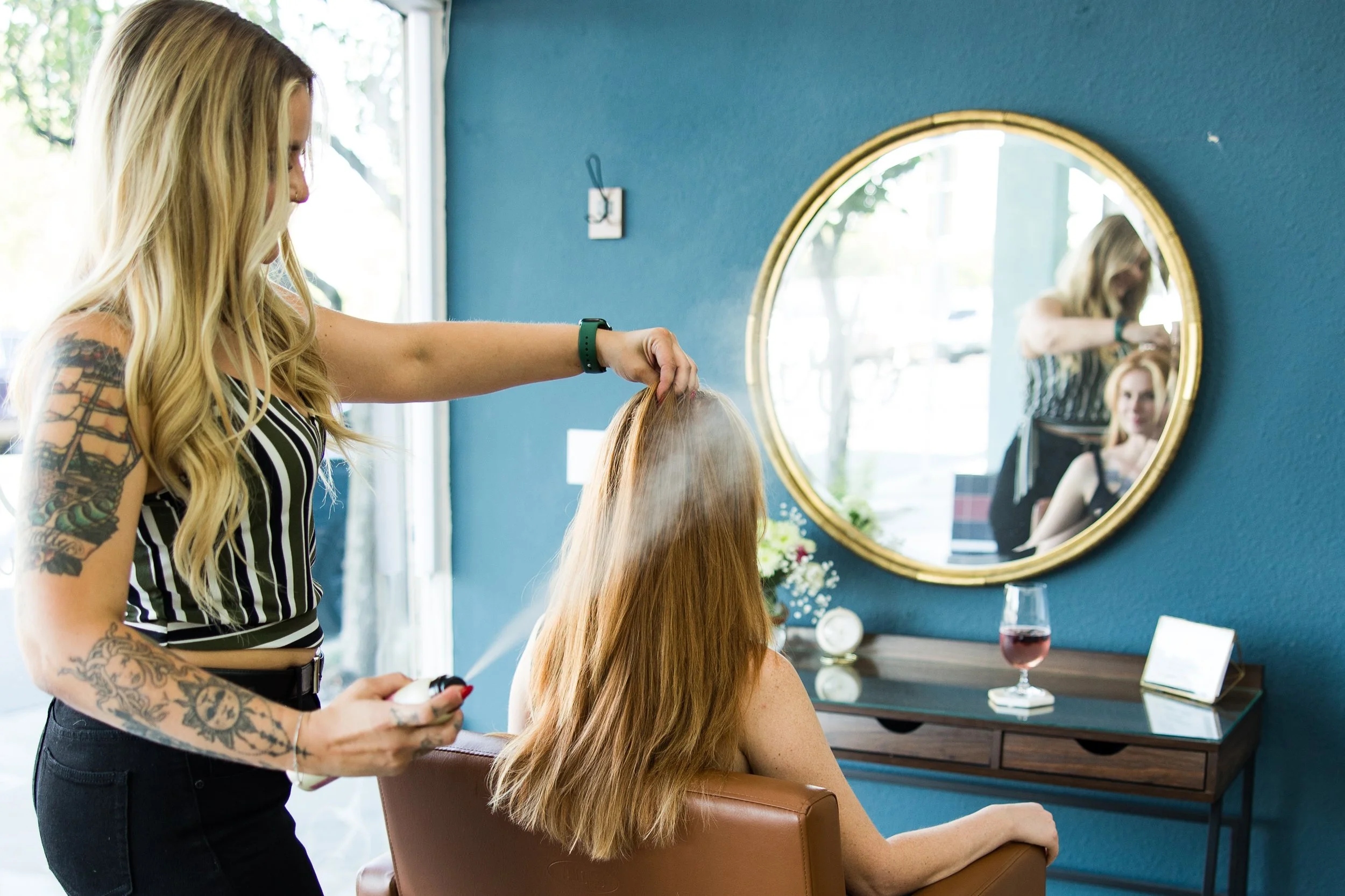 hair-salon-sacramento-spray-mirror-client.jpg