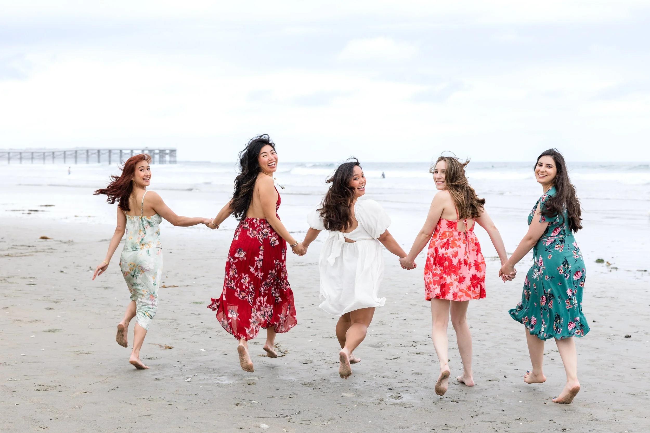 women running on beach