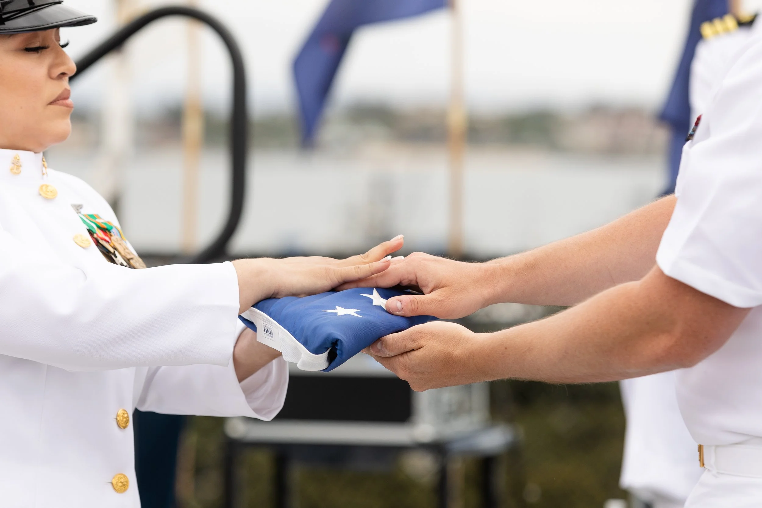Woman receiving US flag