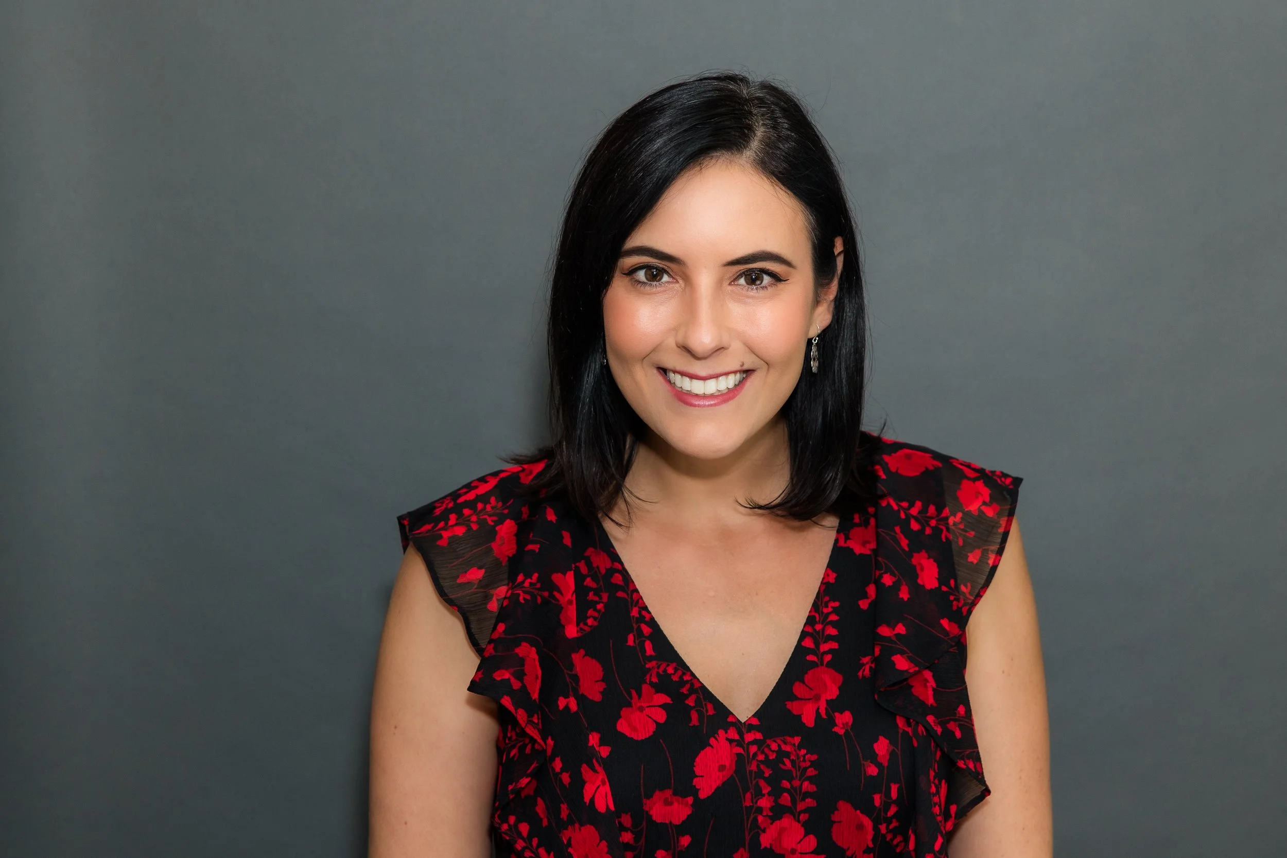 woman black and red dress headshot.jpg