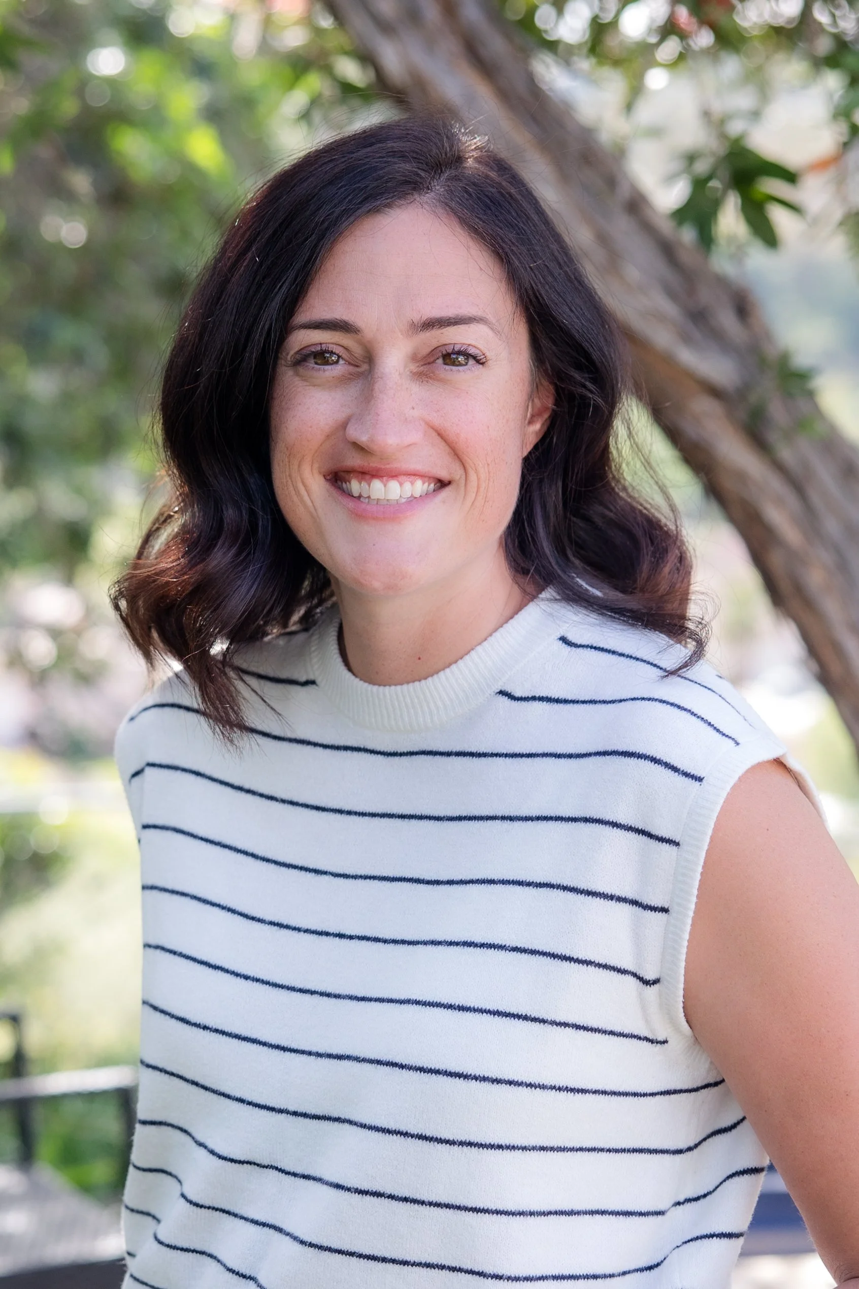 woman in striped shirt headshot.jpg
