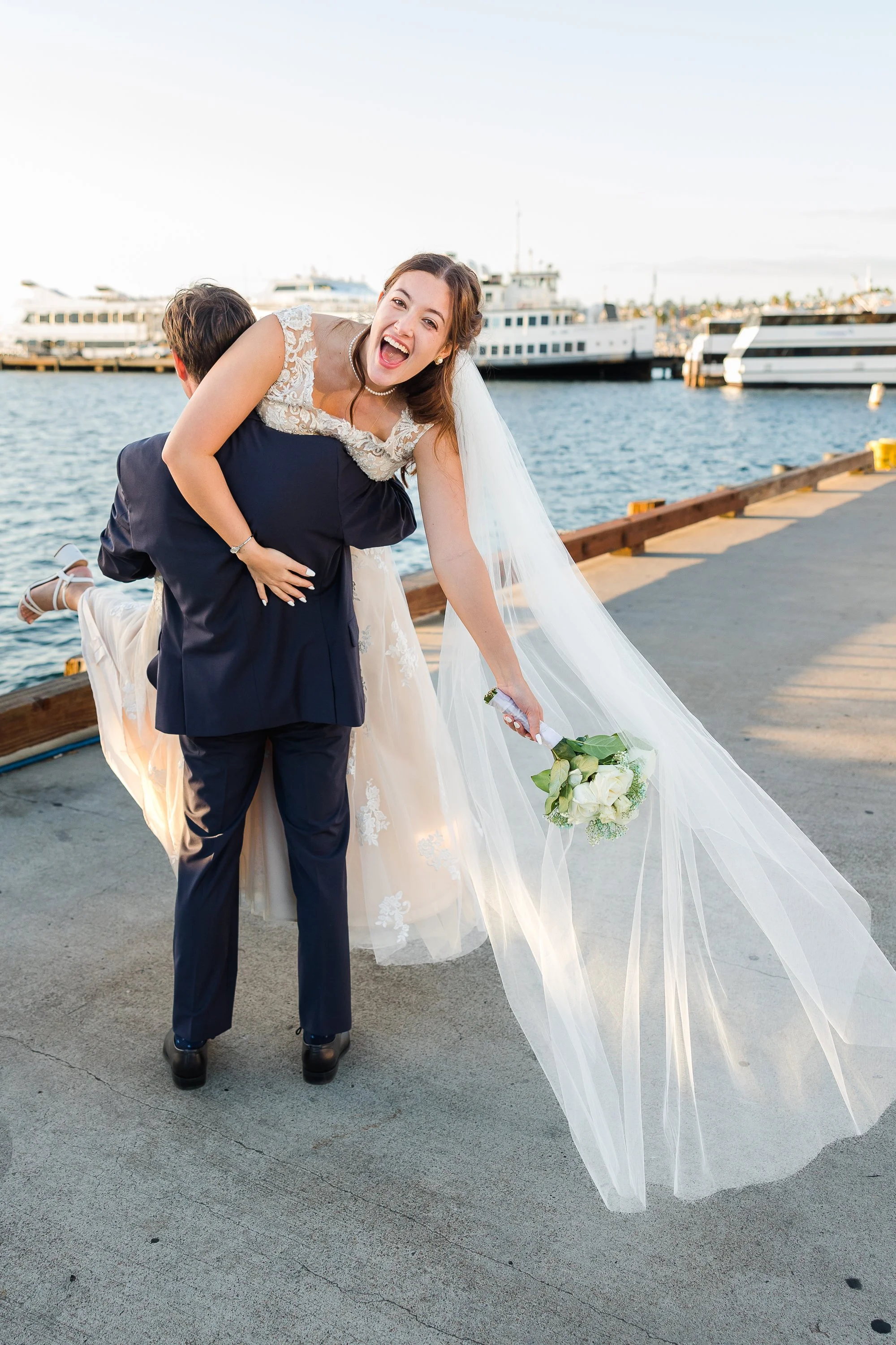 carrying bride waterfront San Diego