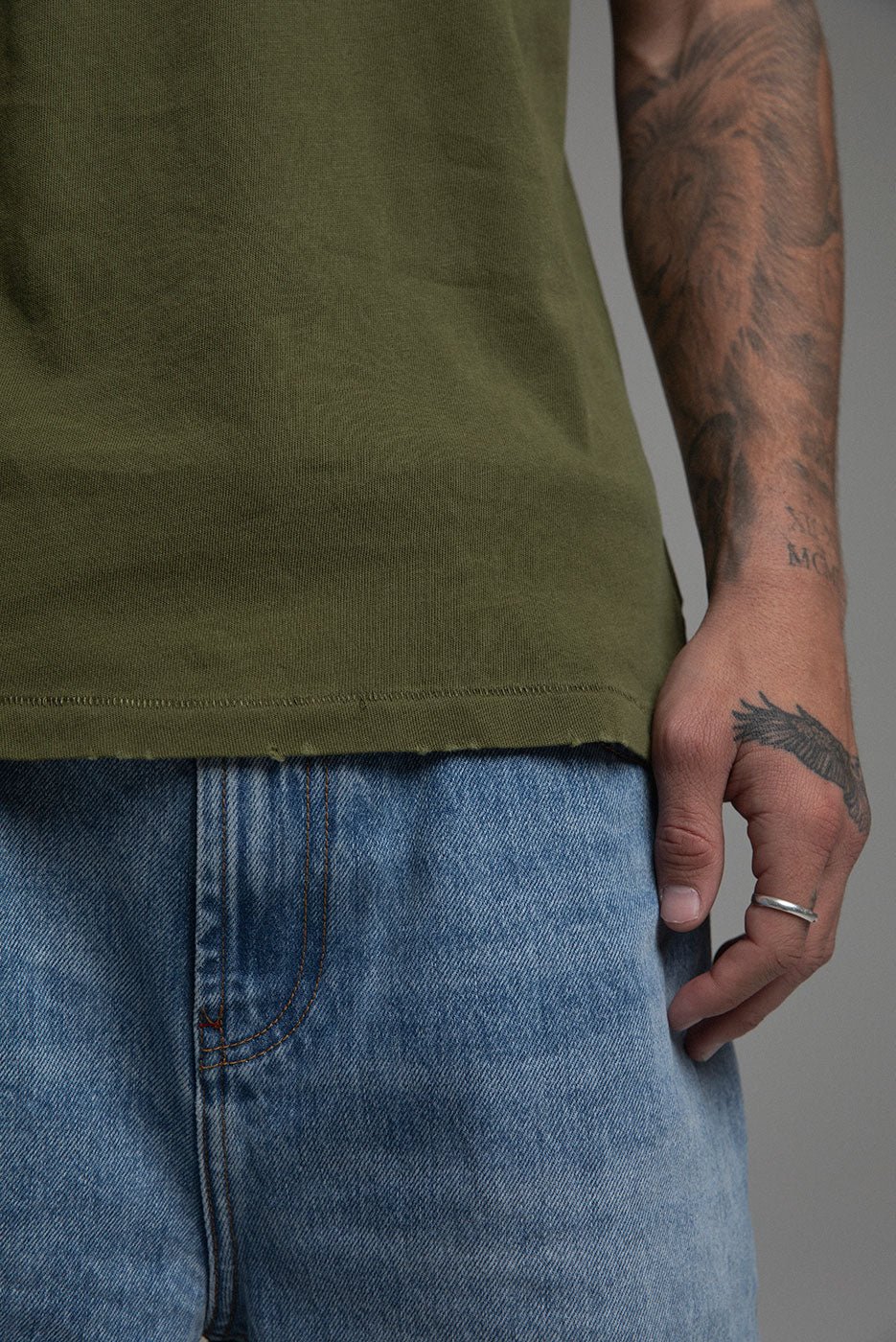 elwood cap sleeve tee olive hem detail.jpg