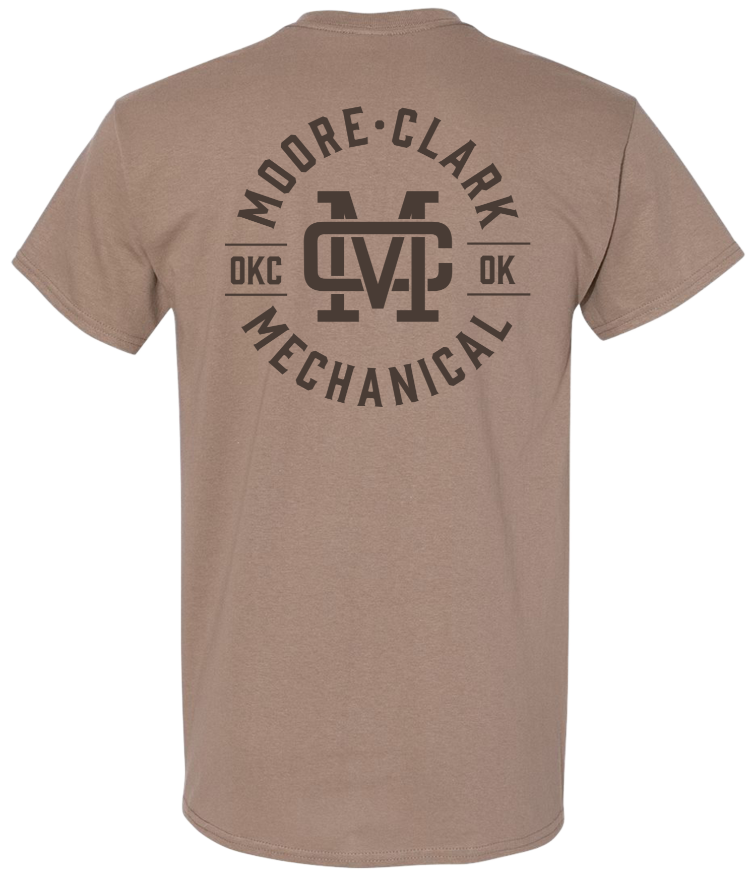 The back of a brown T-shirt with a circular design including the words 'Moore-Clark Mechanical' and the abbreviation 'MC' in a stylized font.