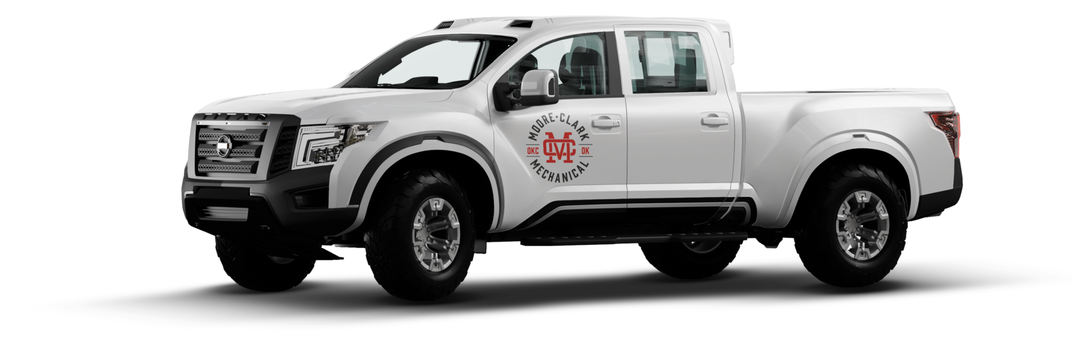 A white pickup truck with a logo for Moore-Clark Mechanical, featuring red and black text and graphics, and black accents on the grille, bumper, and sides.