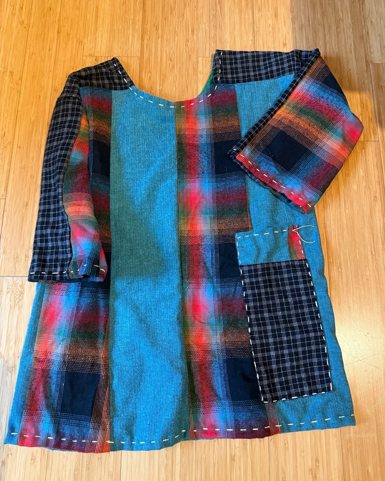 FlanneL tunic top 
Top stitching
And a DeeP pocket