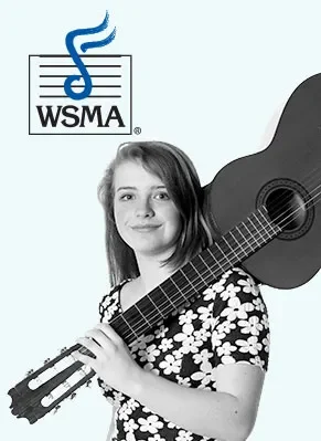 high schooler with guitar