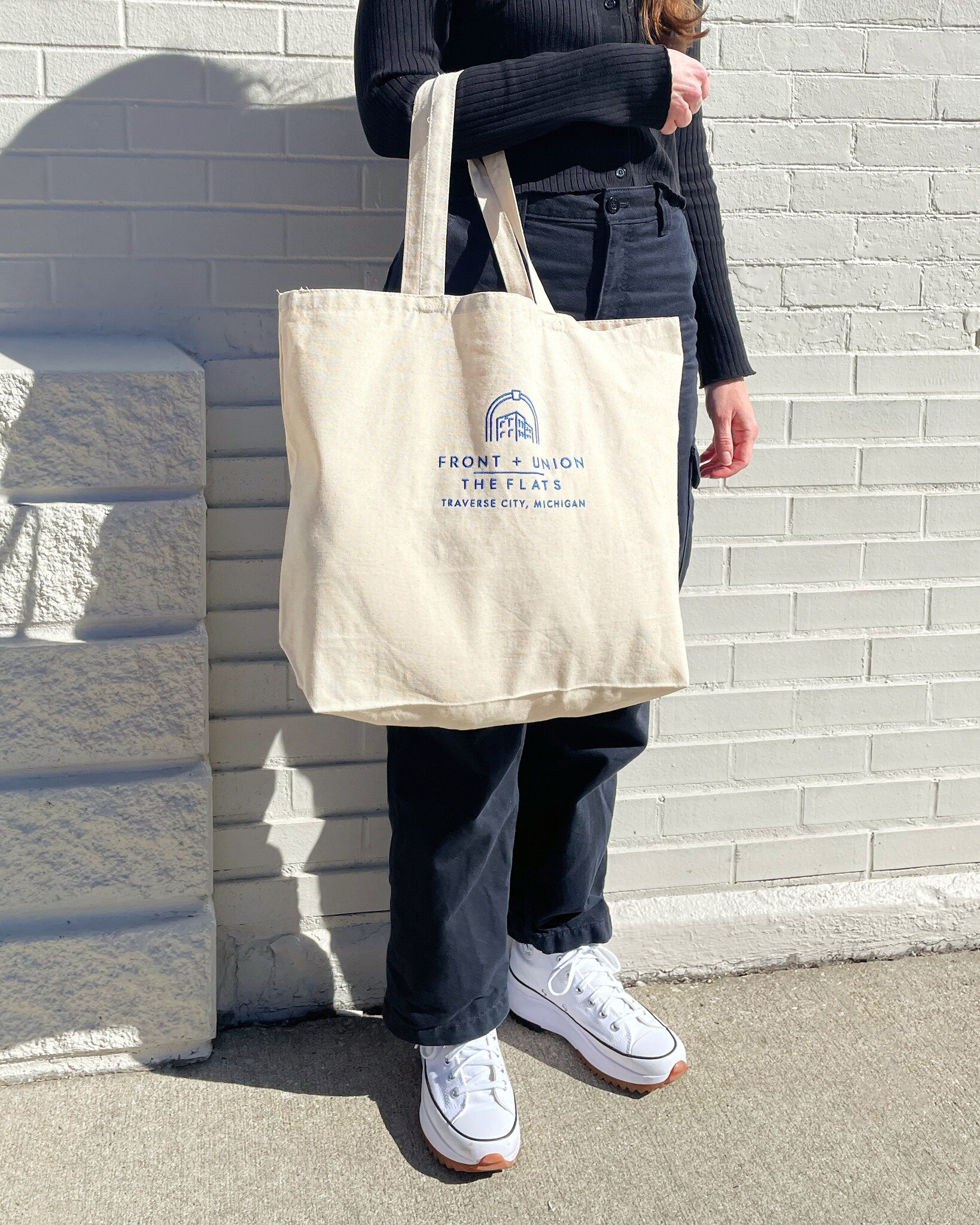 Carry a piece of Front &amp; Union with you! Enjoy our complimentary tote bag during your stay and take it home as a keepsake of your Traverse City experience.
.
.
.
#TheFlats #TraverseCity #DowntownTraverseCity #Totebag #Sustainability