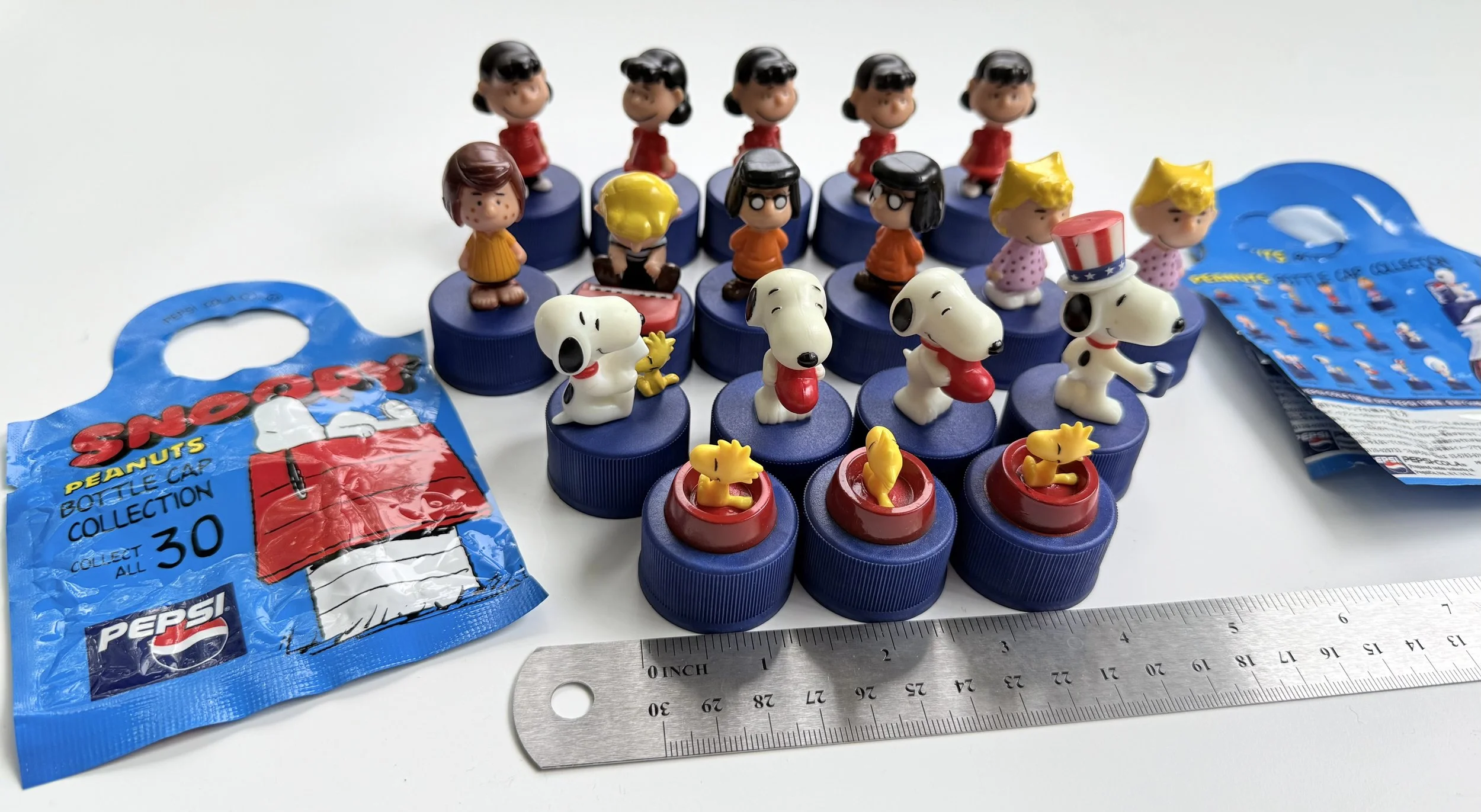Pepsi Bottle Cap Collection Assorted Snoopy Peanuts from 2001