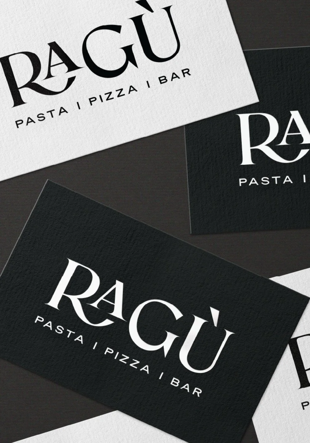 Ragù Pasta Pizza Bar brand card mockup featuring black and white logo cards with refined Italian restaurant branding.