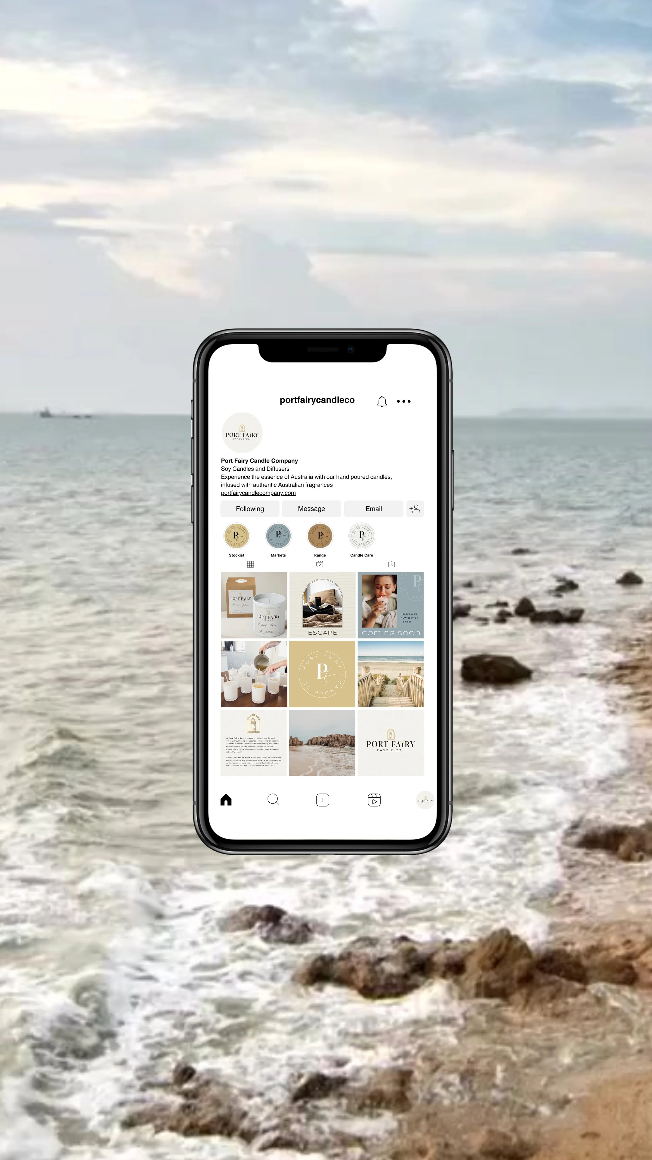 Port Fairy Candle Co. Instagram mockup displayed on a phone over an ocean background, featuring coastal candle branding, story highlights and product content grid.