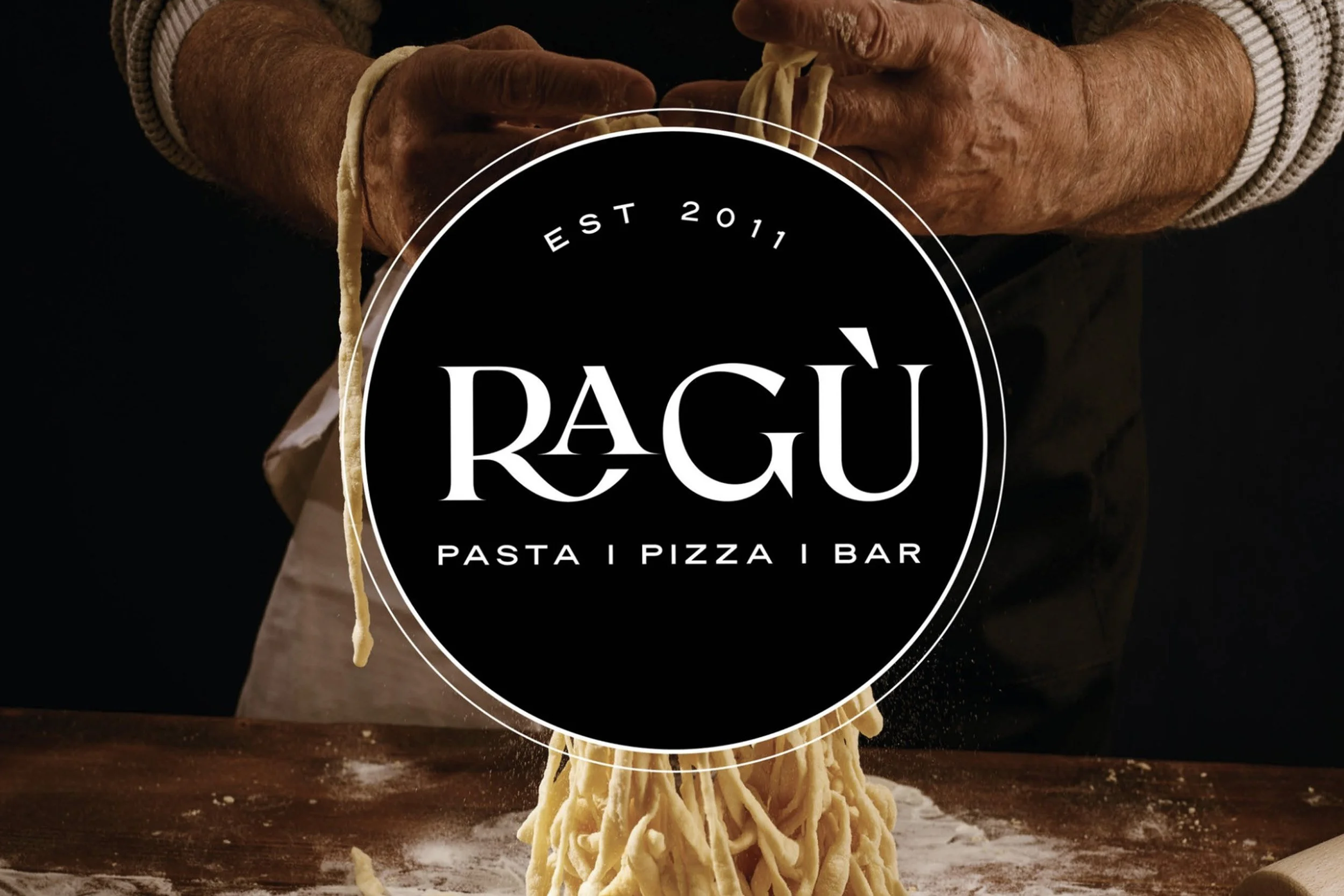 Ragù Pasta Pizza Bar brand identity hero image featuring the logo over fresh handmade pasta being prepared in a moody Italian restaurant setting.