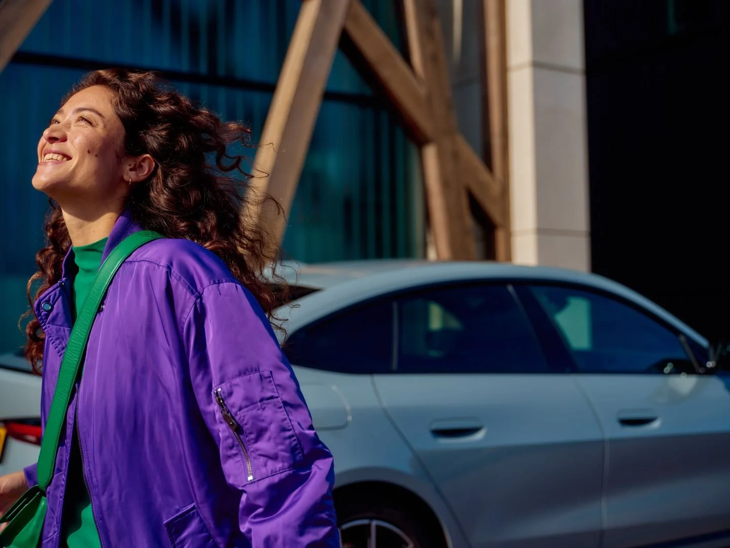 Happy driver in an urban setting, Athlon Car Lease shoot in Amsterdam
