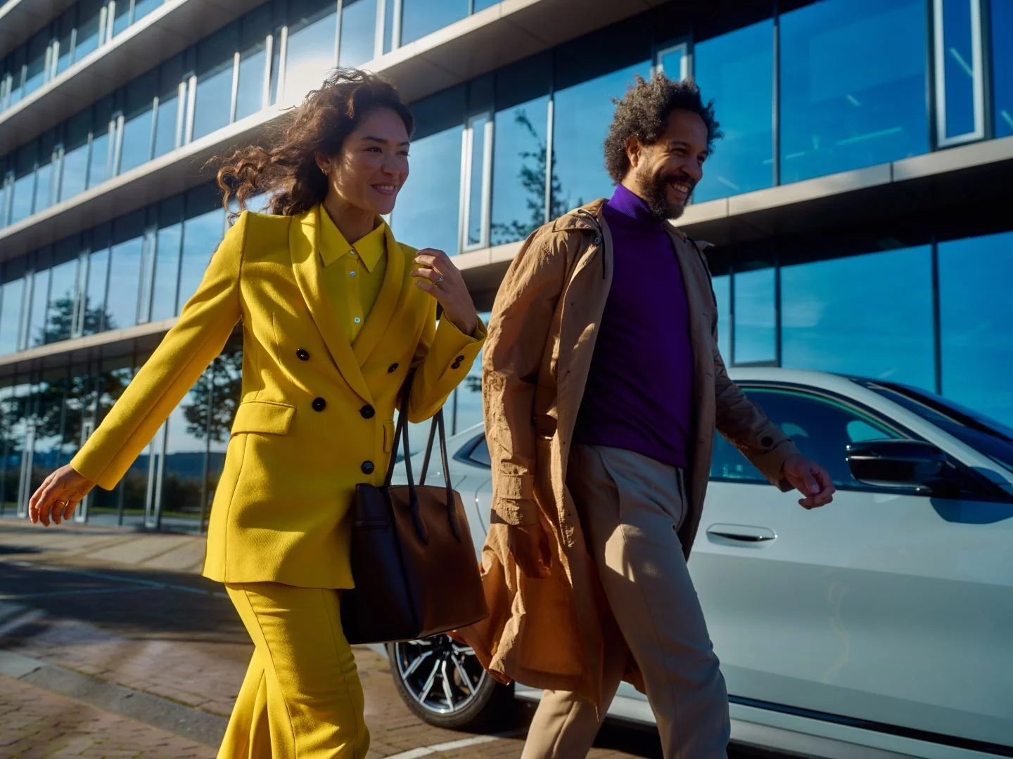 Man and woman walking through the city, Athlon Car Lease shoot in Amsterdam