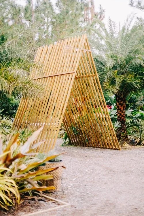 Bamboo arch in tropical garden at outdoor wedding venue near Palm Bay Florida