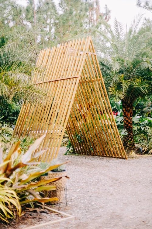 Bamboo arch in tropical garden at outdoor wedding venue near Spring Hill Florida