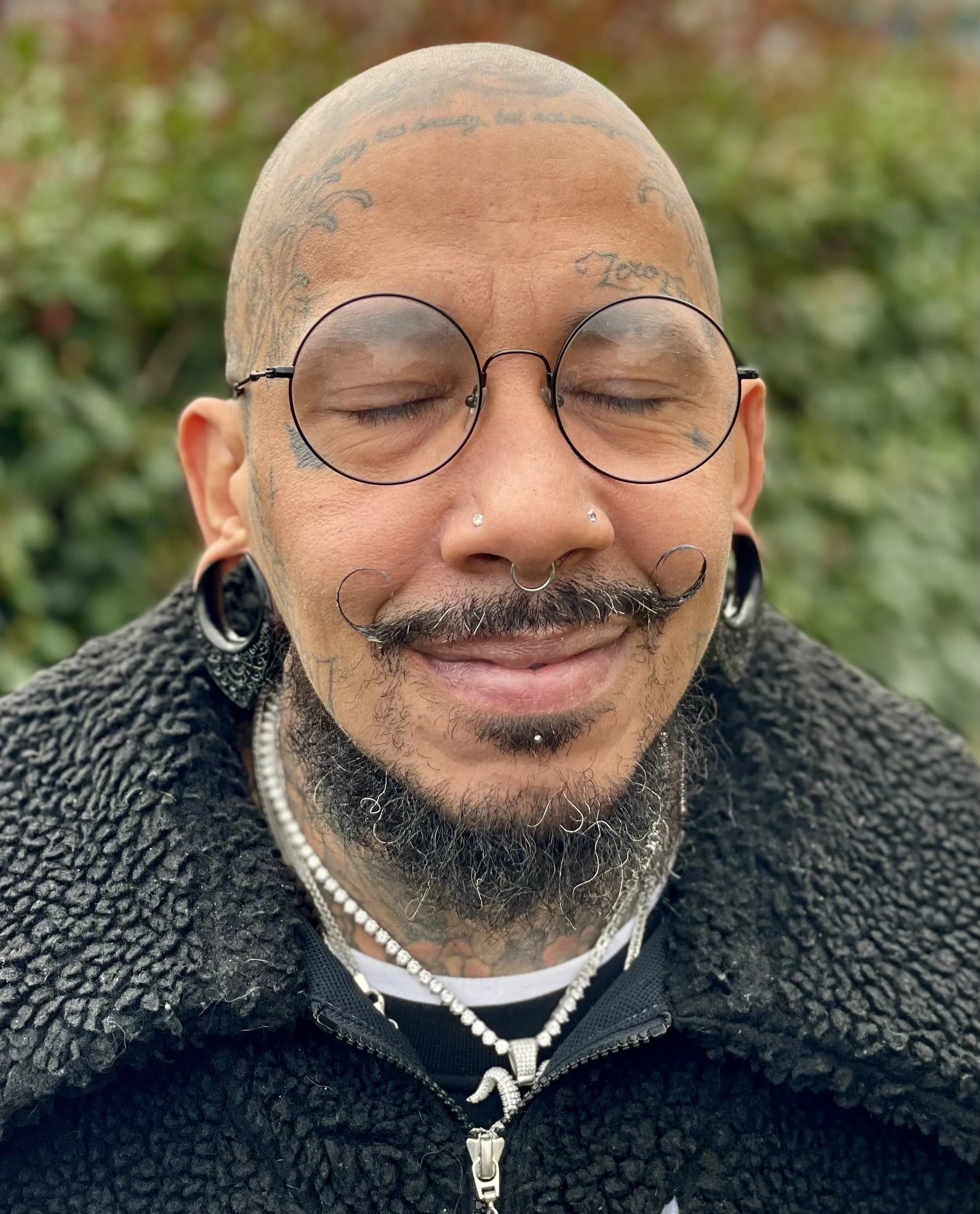 Black man tattoo love.jpeg