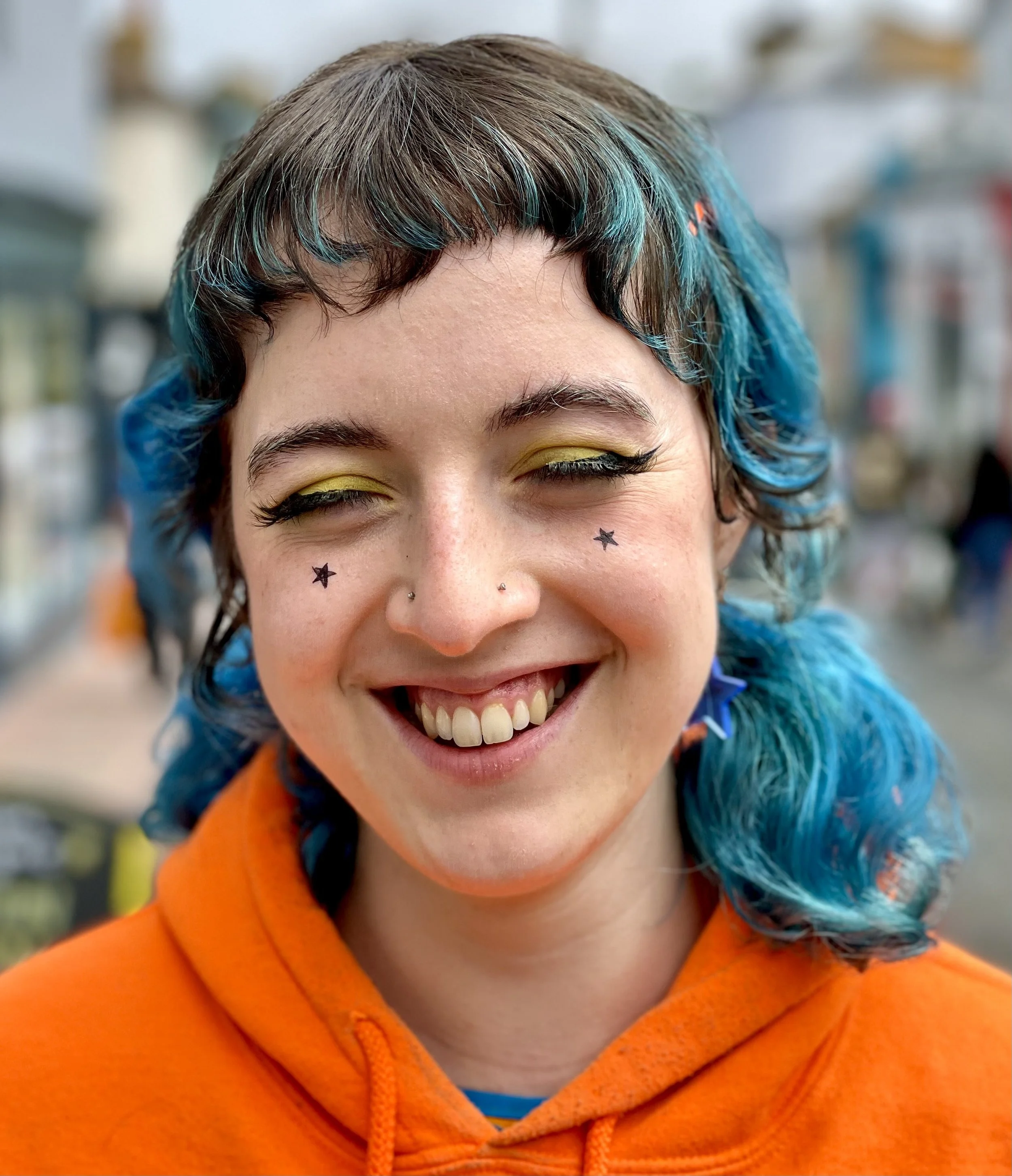 White tattoo girl laughter.jpeg