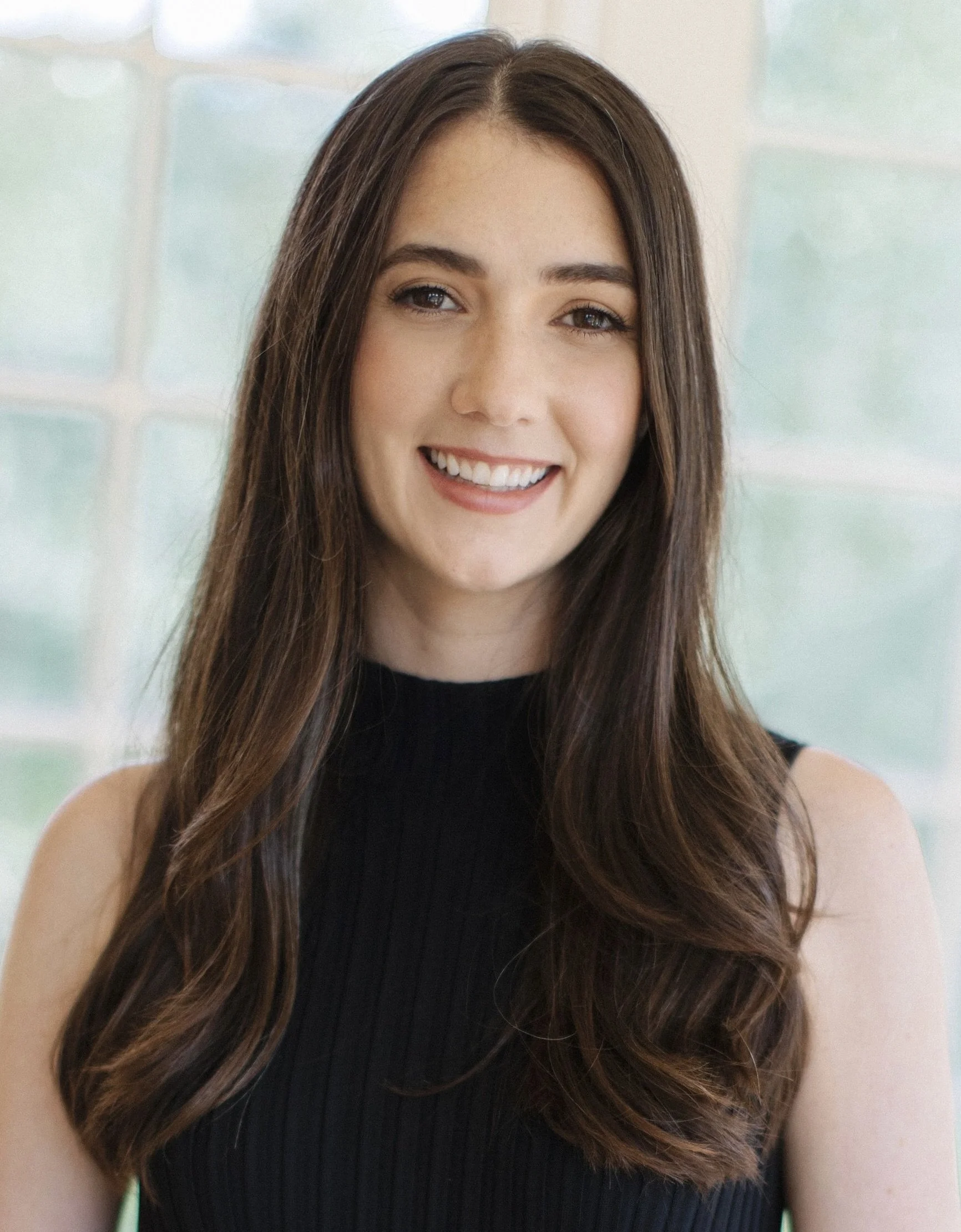 Headshot for Carly Hillman author of "The Refuge" and producer at The Late Show with Stephen Colbert.