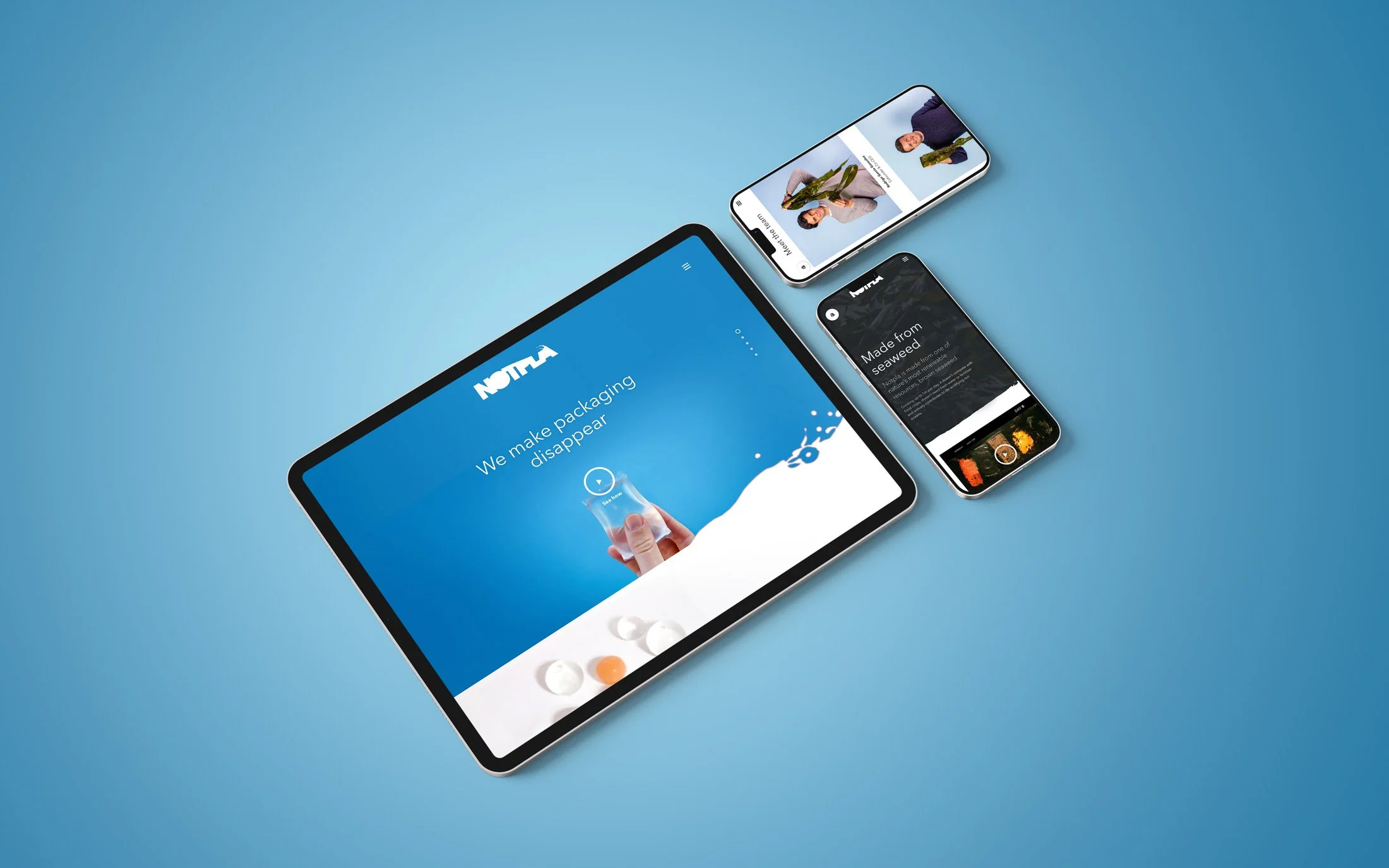 Three electronic devices displaying different digital content, placed on a flat blue surface. The largest device is a tablet showing a blue screen with white text, the second is a smartphone with a black background and white text, and the third is a smartphone with a white background and images of people.