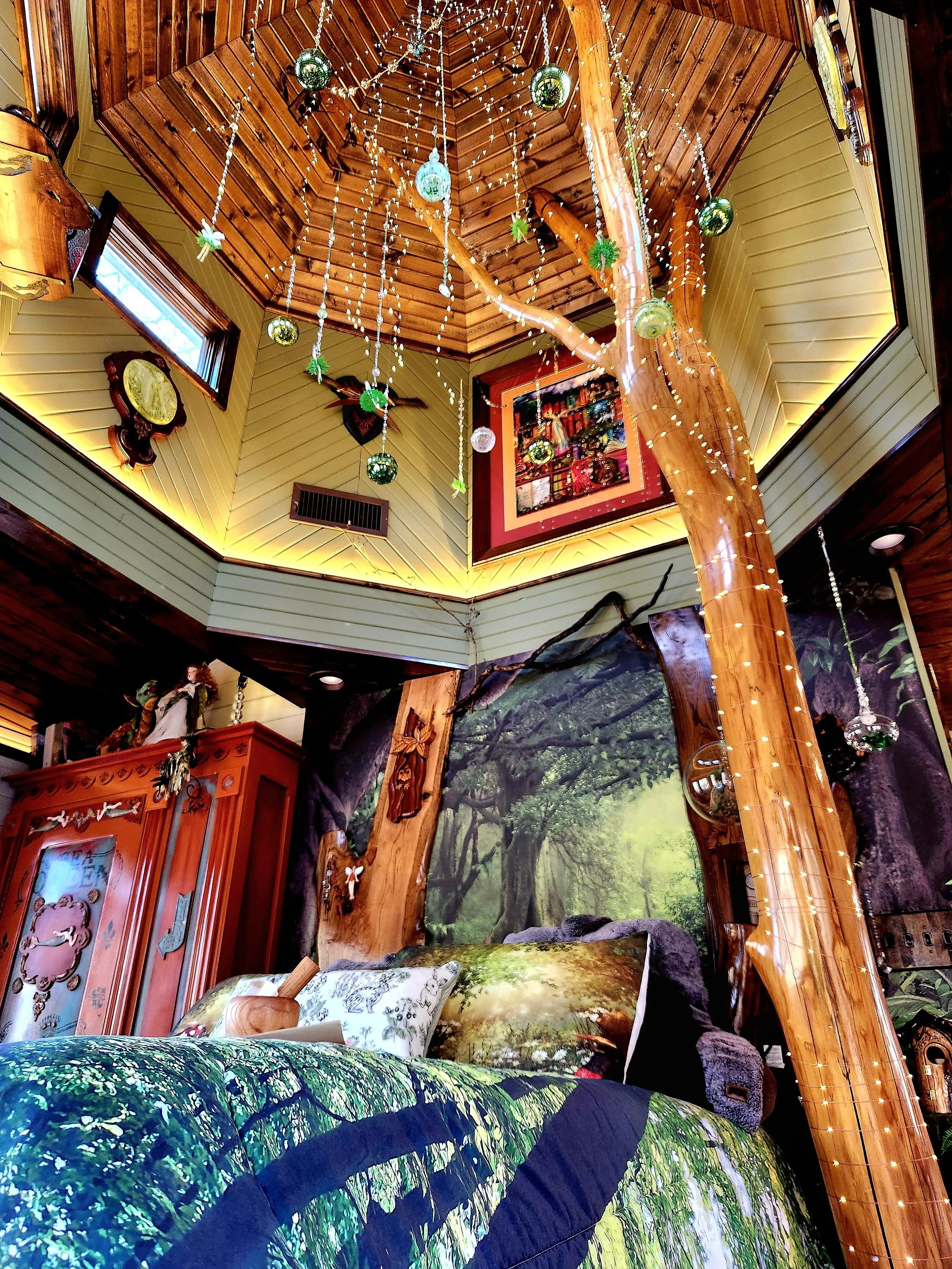 Ornate Bedroom with Chandelier and Mural