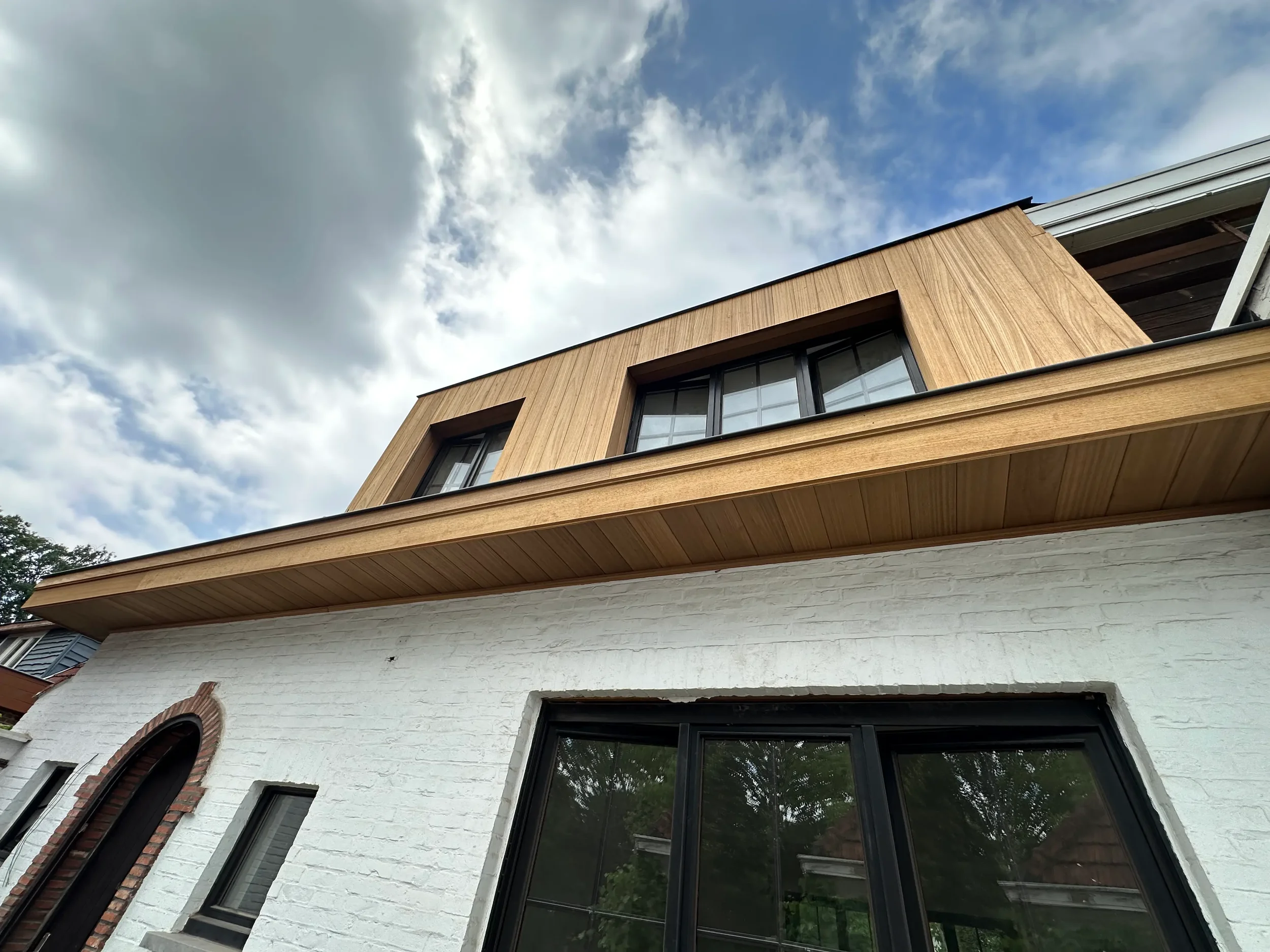 gevel laten bekleden in geel