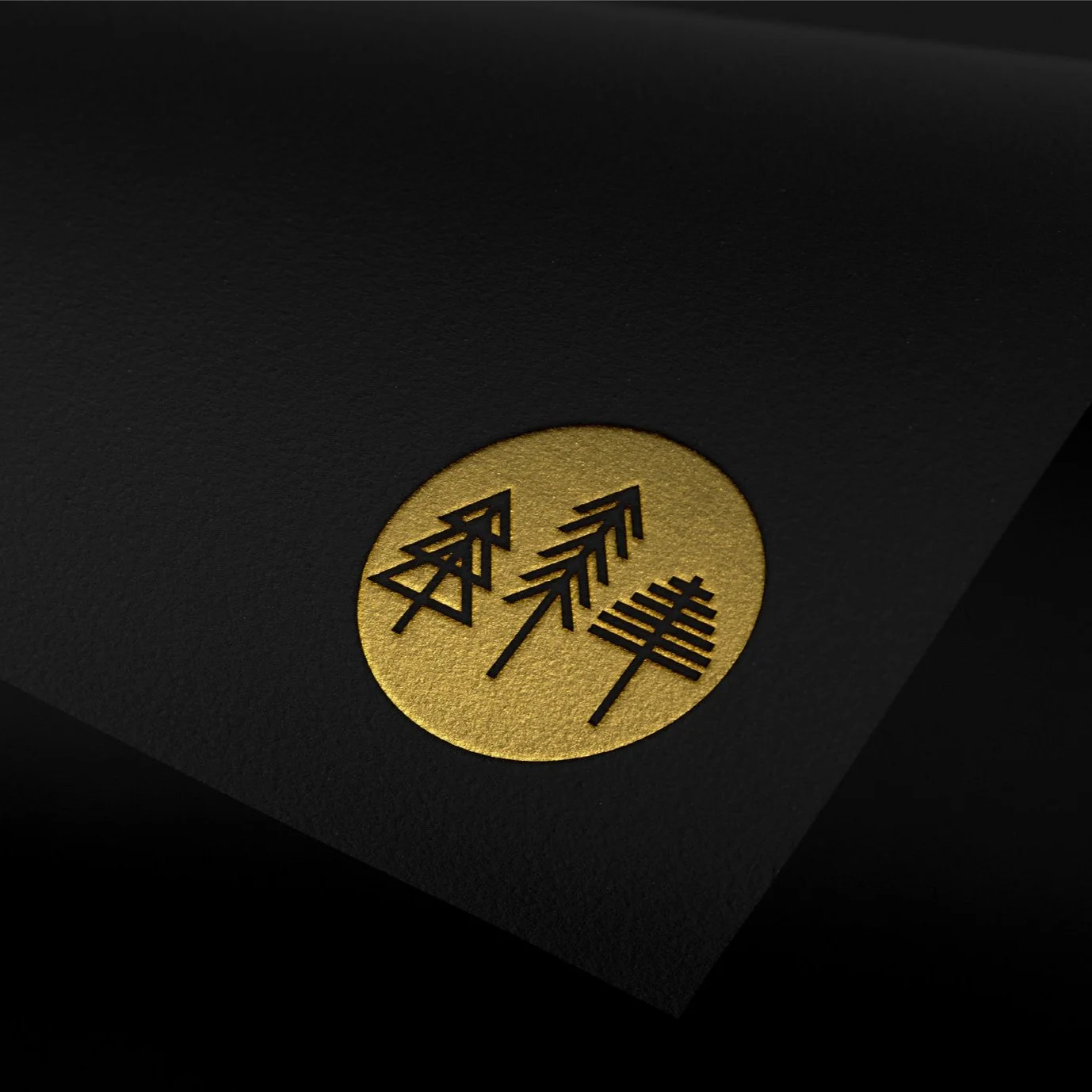 Black paper with a gold circle featuring black Japanese characters.