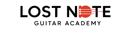 Logo for Lost Note Guitar Academy with the text 'LOST NOTE' and a stylized red guitar pick replacing the 'O', and 'GUITAR ACADEMY' beneath.