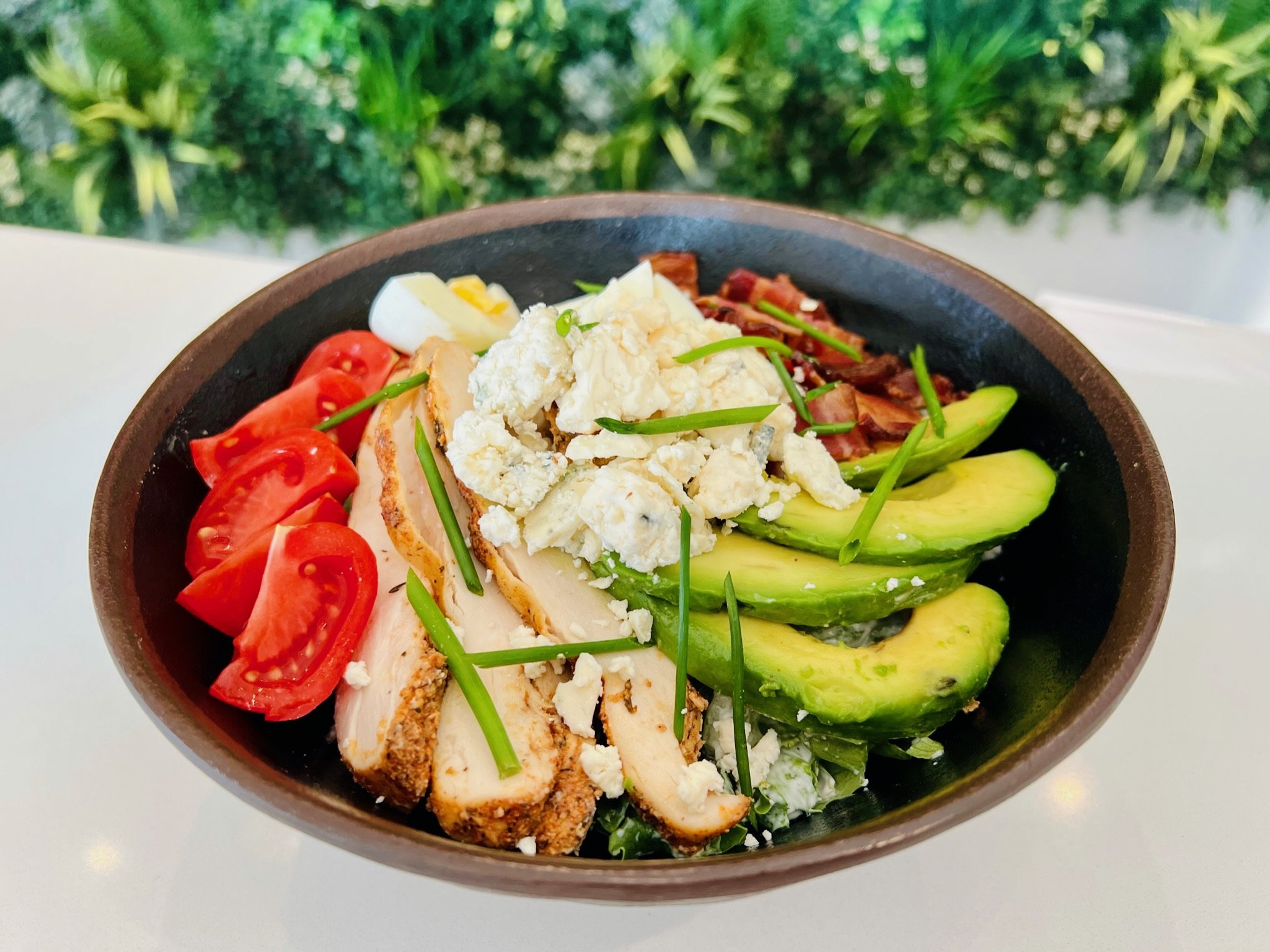 GLASSES COBB bacon, chicken, hard-boiled egg, avocado, heirloom cherry tomatoes, chive batons, little leaf lettuce, blue cheese dressing