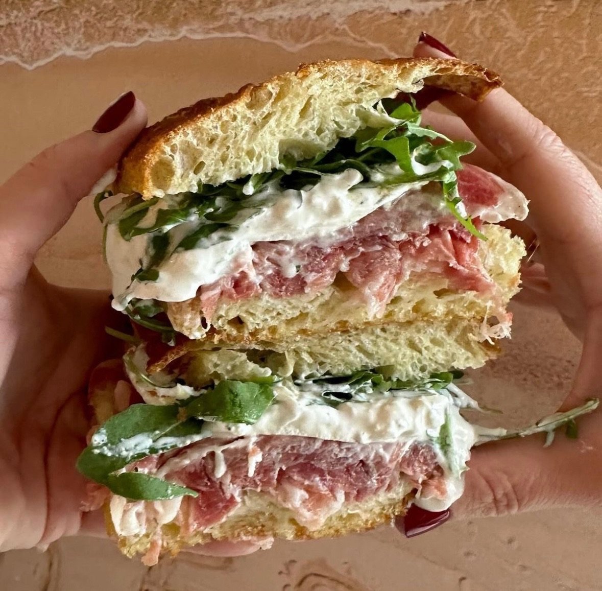 ISLAND MAMBO 16 month aged imported prosciutto, burrata, truffle honey, arugula on house focaccia