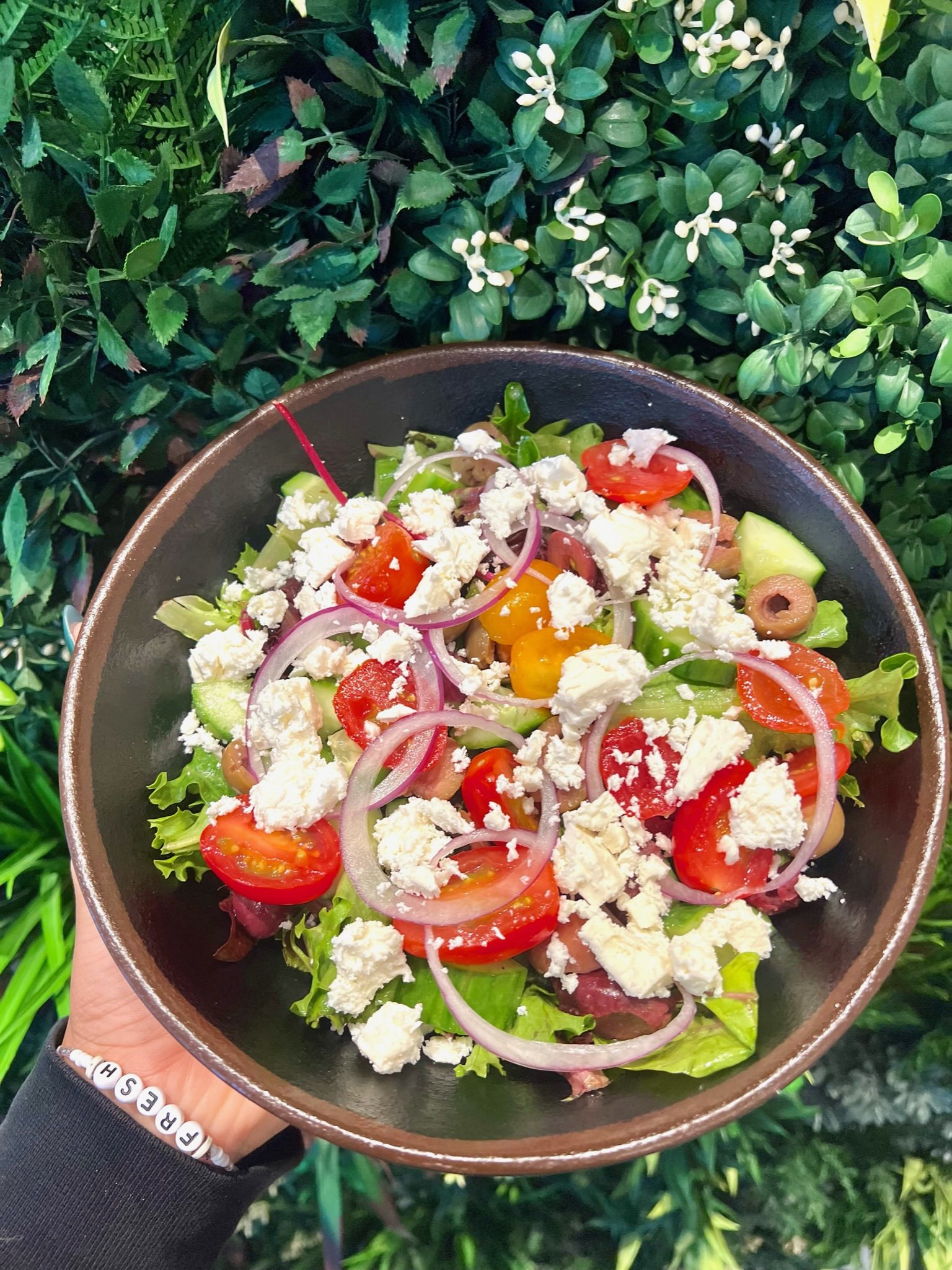 THE GREEK BABY mixed greens, cucumber, feta, kalamata olives, cherry tomato, sliced red onion, greek dressing
