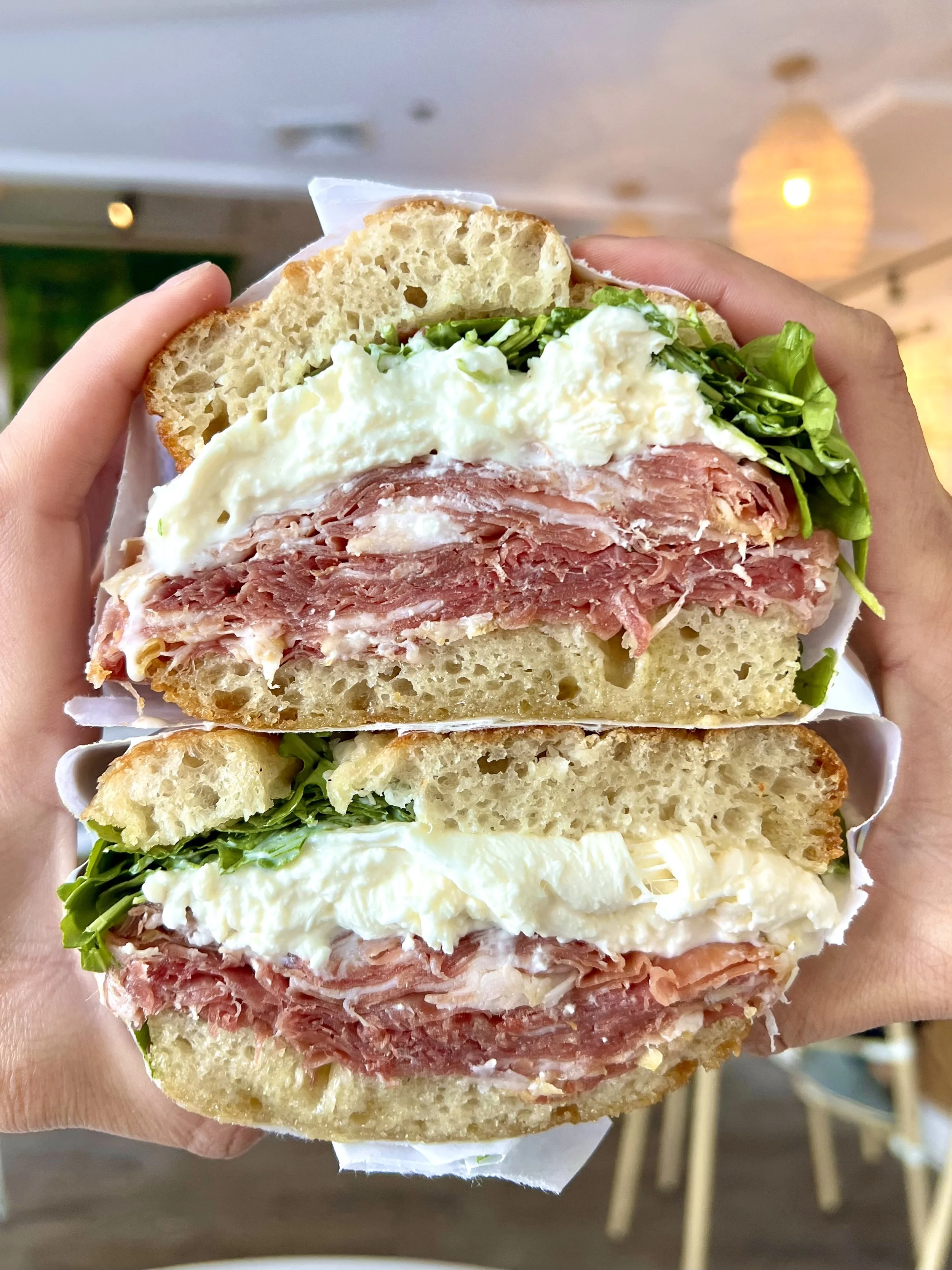 ISLAND MAMBO 16 month aged imported prosciutto, burrata, truffle honey, arugula on Fresh focaccia