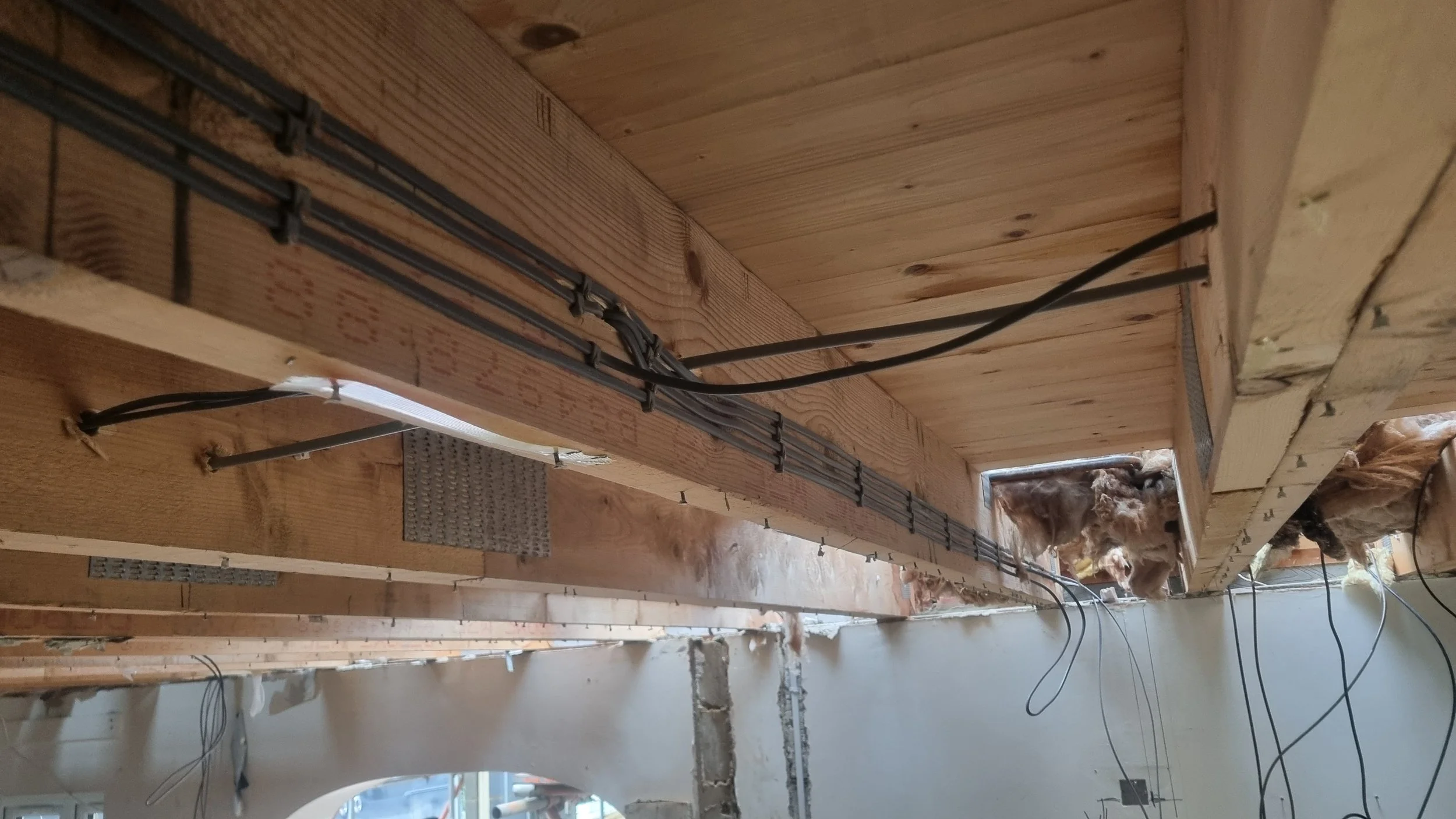 Electrical rewire installation in progress during house renovation
