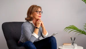 A woman listening during a counselling session