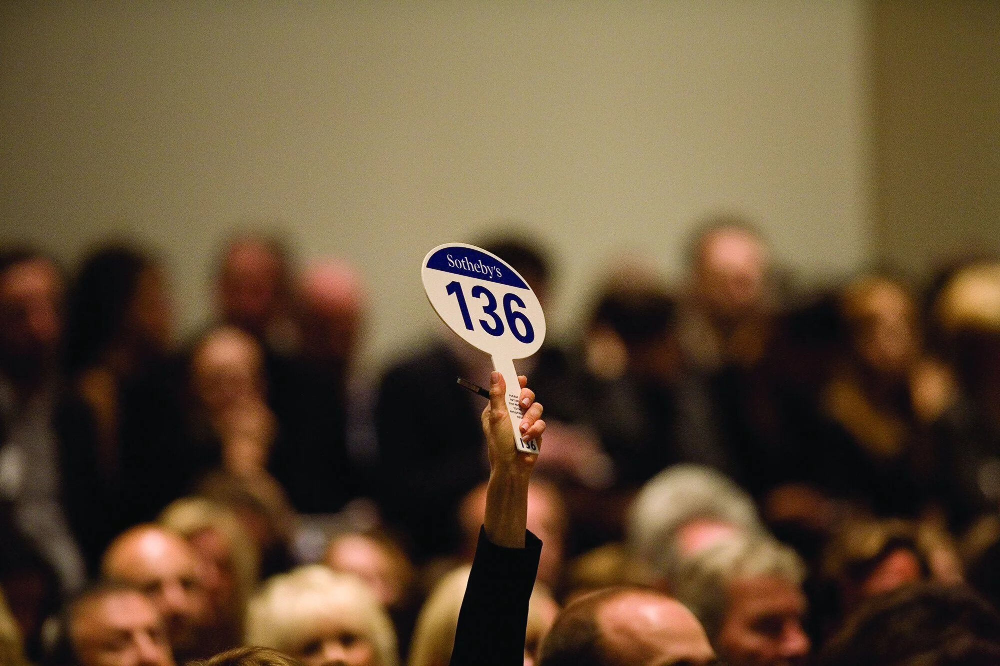 Auction_house-paddle-bid.jpeg