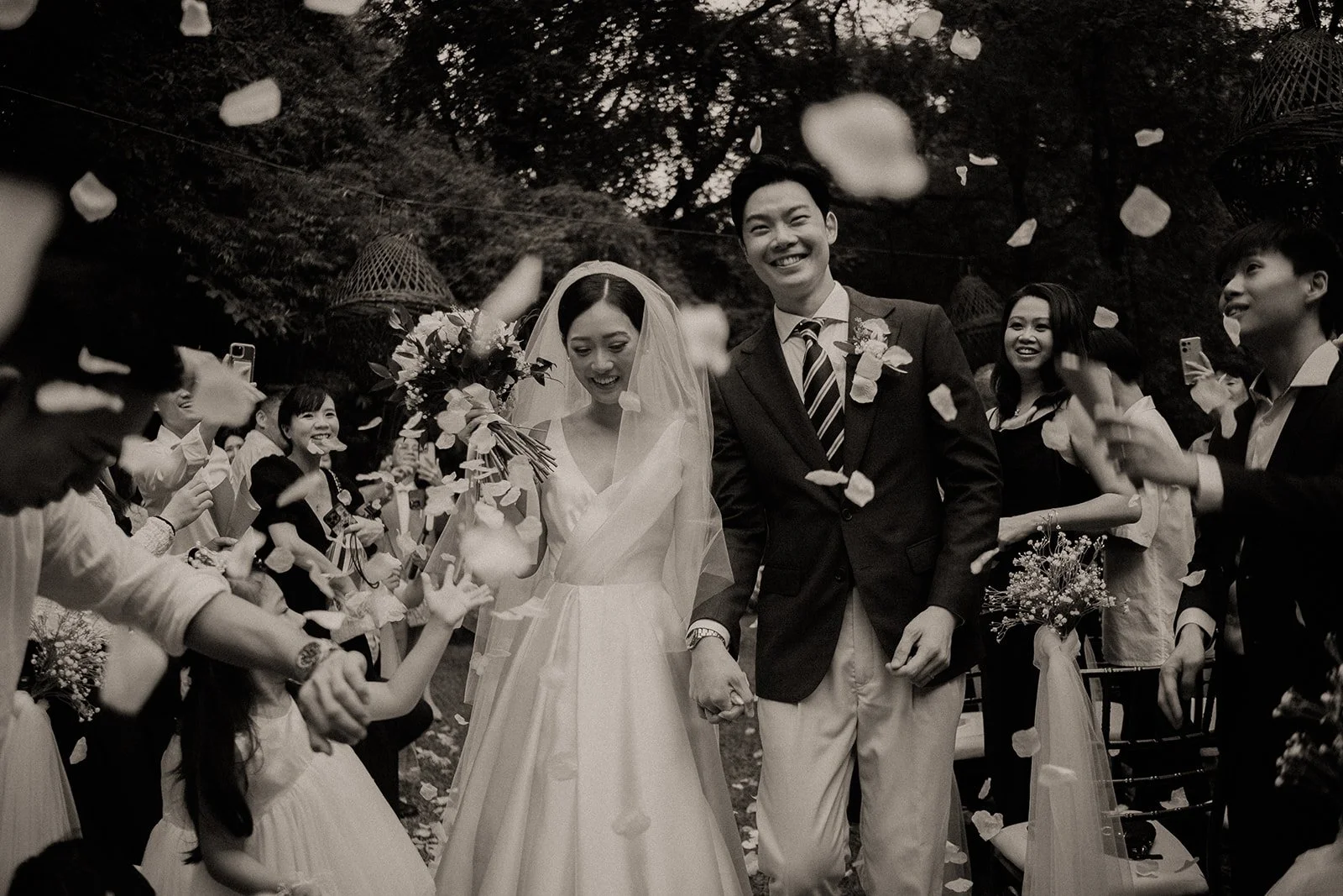 A black and white photo of a singapore wedding couple held at Tamarind Hill solemnisation.
