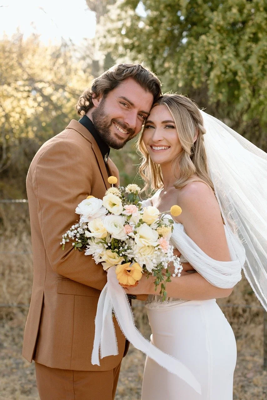 Bride and groom wedding photo during sunset at Saguaro Lake Guest Ranch