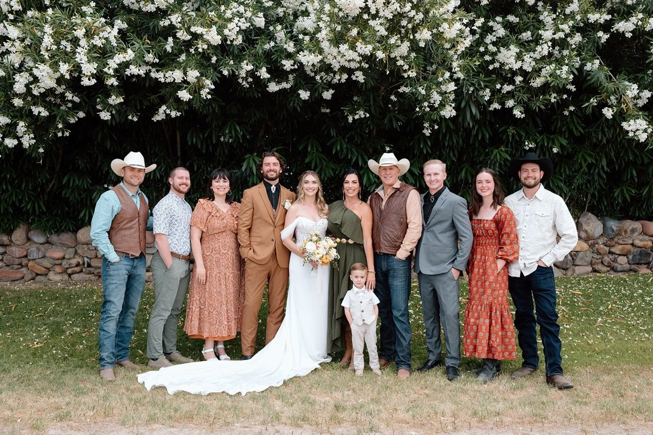 Wedding Family portraits at Saguaro Lake Guest Ranch. Beautiful floral backdrop