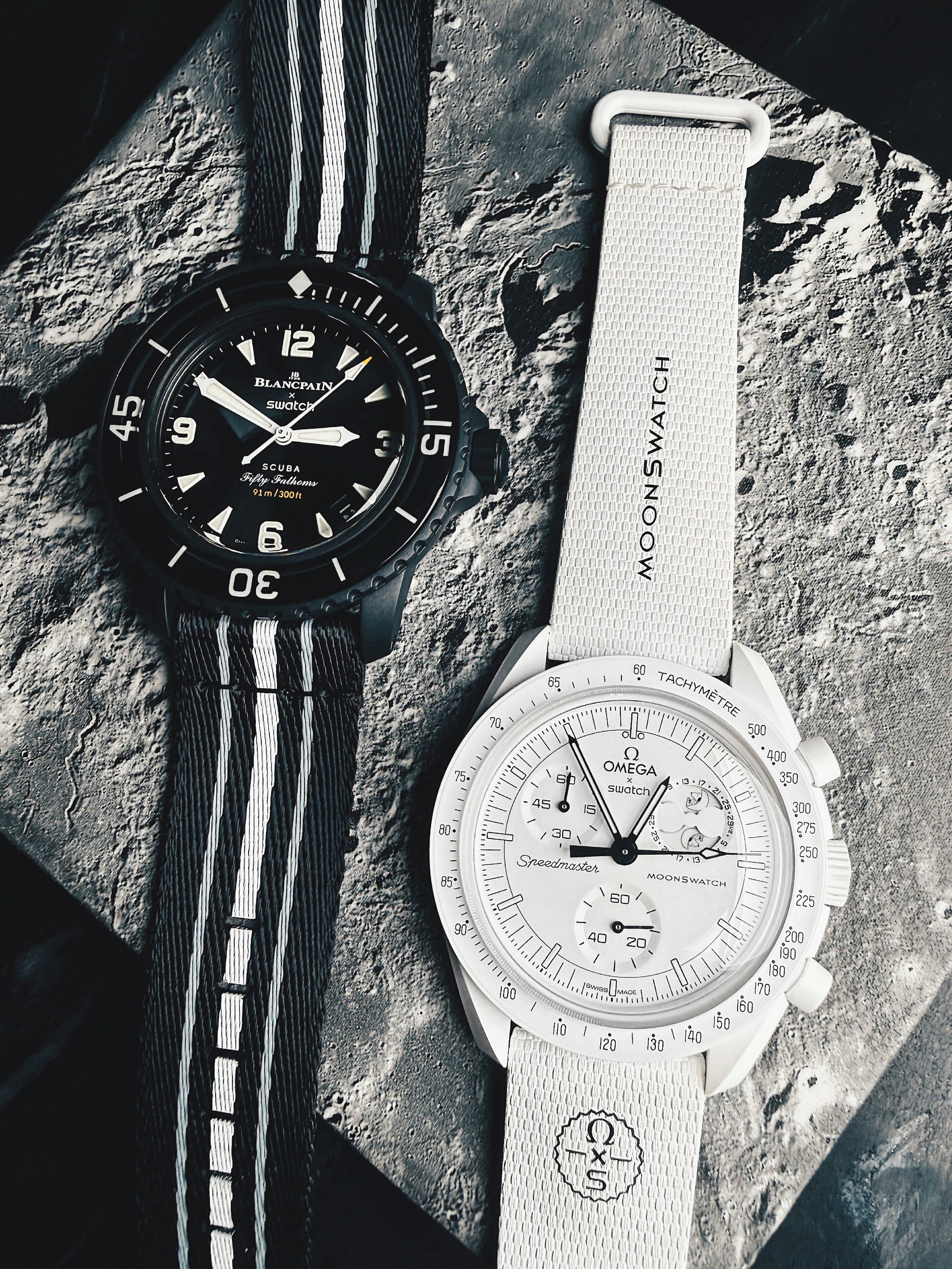 _collection : * OMEGA X SWATCH : MISSION TO THE MOONPHASE &mdash; FULL MOON / BLANCPAIN X SWATCH : SCUBA FIFTY FATHOMS &mdash;&nbsp;OCEAN OF STORMS

These two Swatch collaborations with luxury, historic watch brands feature moon related inspirations.