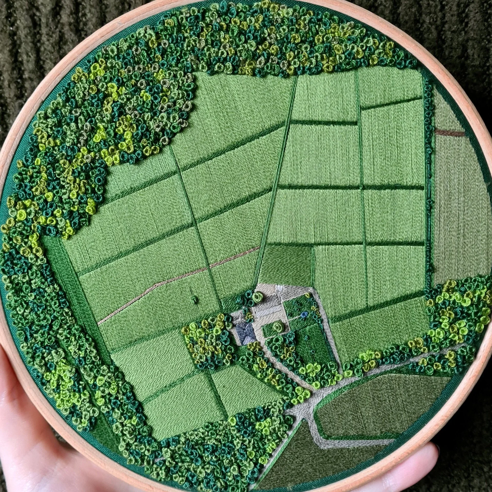 Aerial landscape embroidery of a French Chateau and vineyard