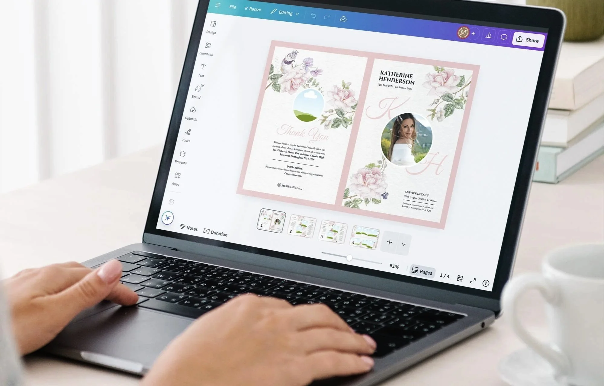 Person working on a laptop designing a funeral order of service with floral design and a photo of a woman.